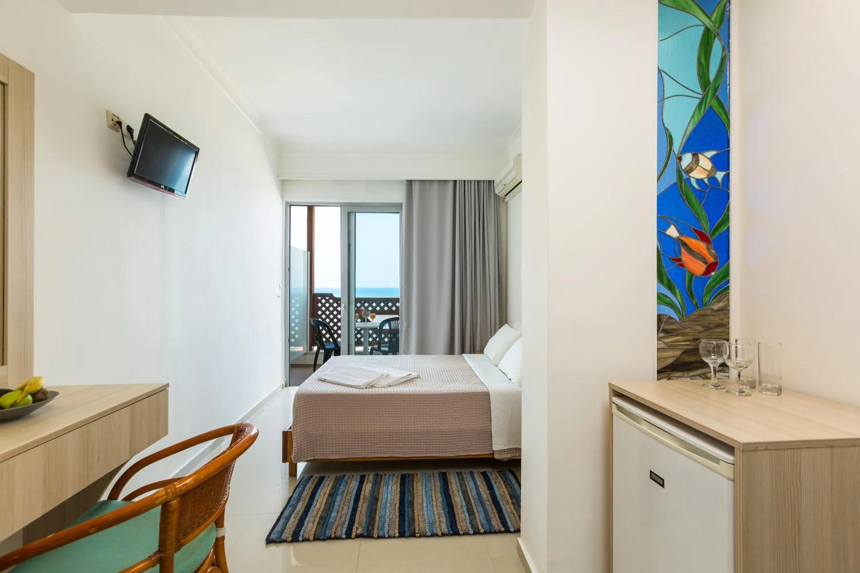 Bed in Poseidon Hotel