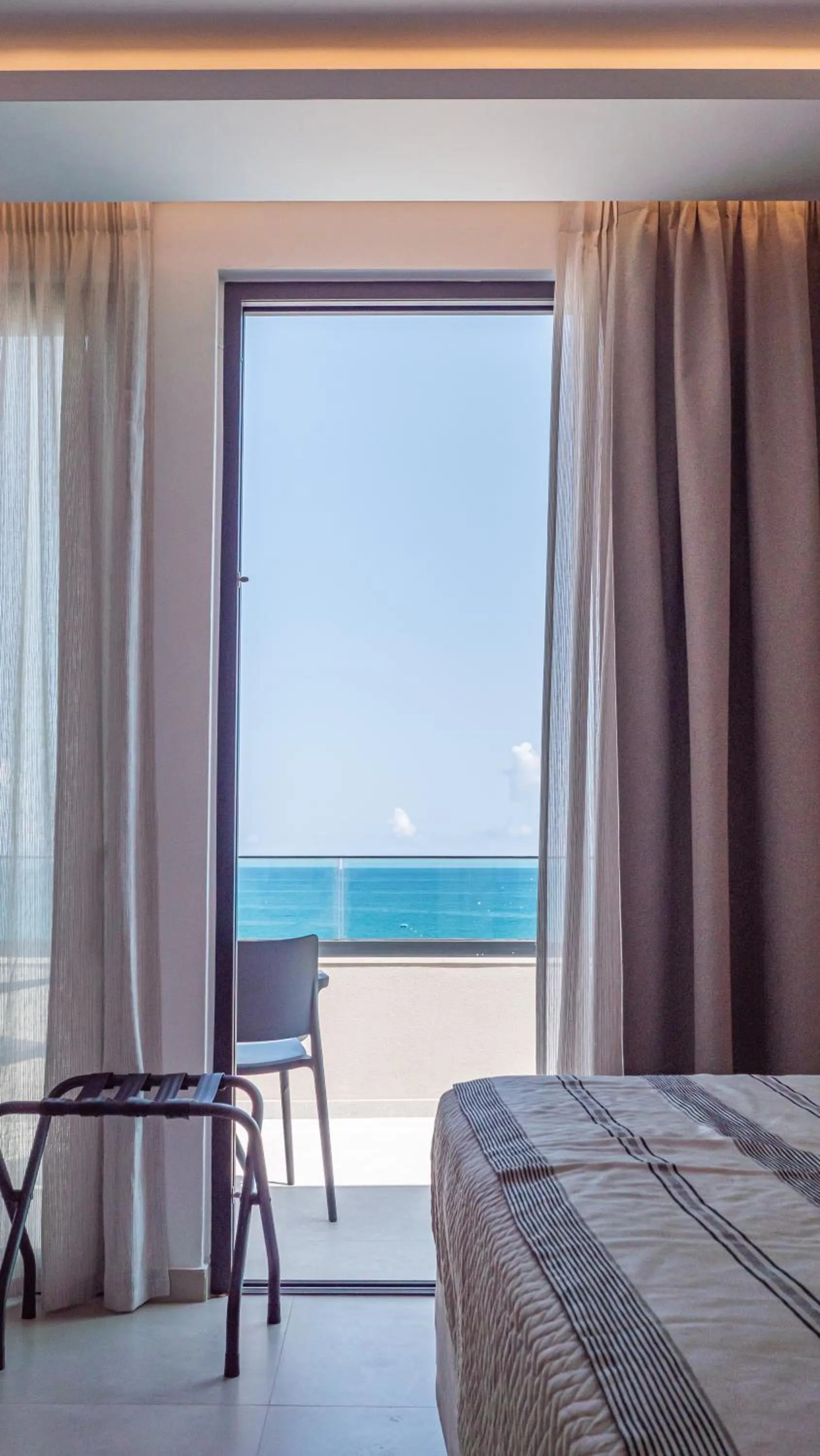 Bed in Poseidon Hotel