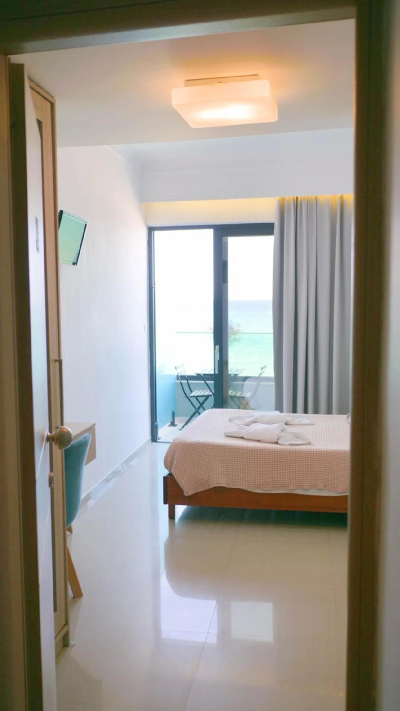 Bed in Poseidon Hotel