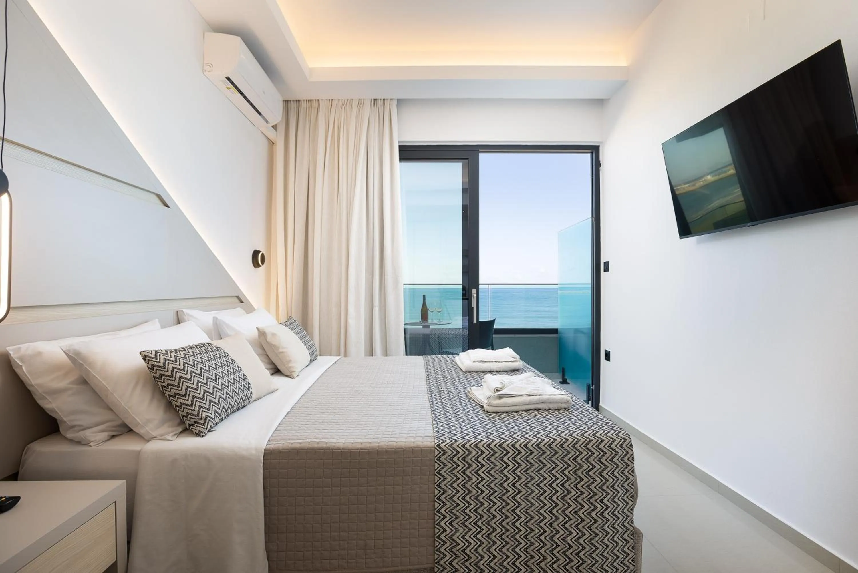 Bed in Poseidon Hotel