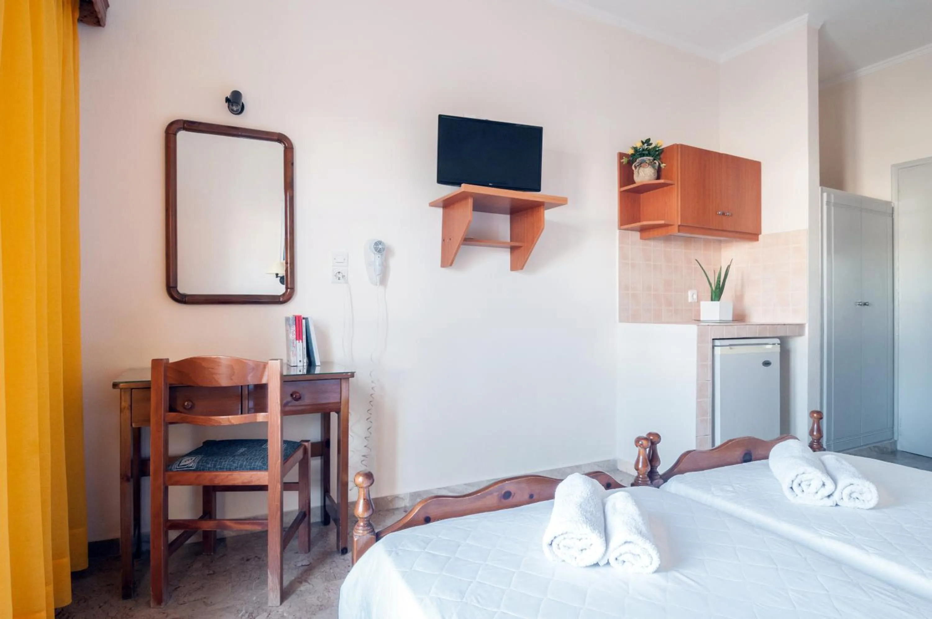 Bed in Holiday Beach Resort Santorini