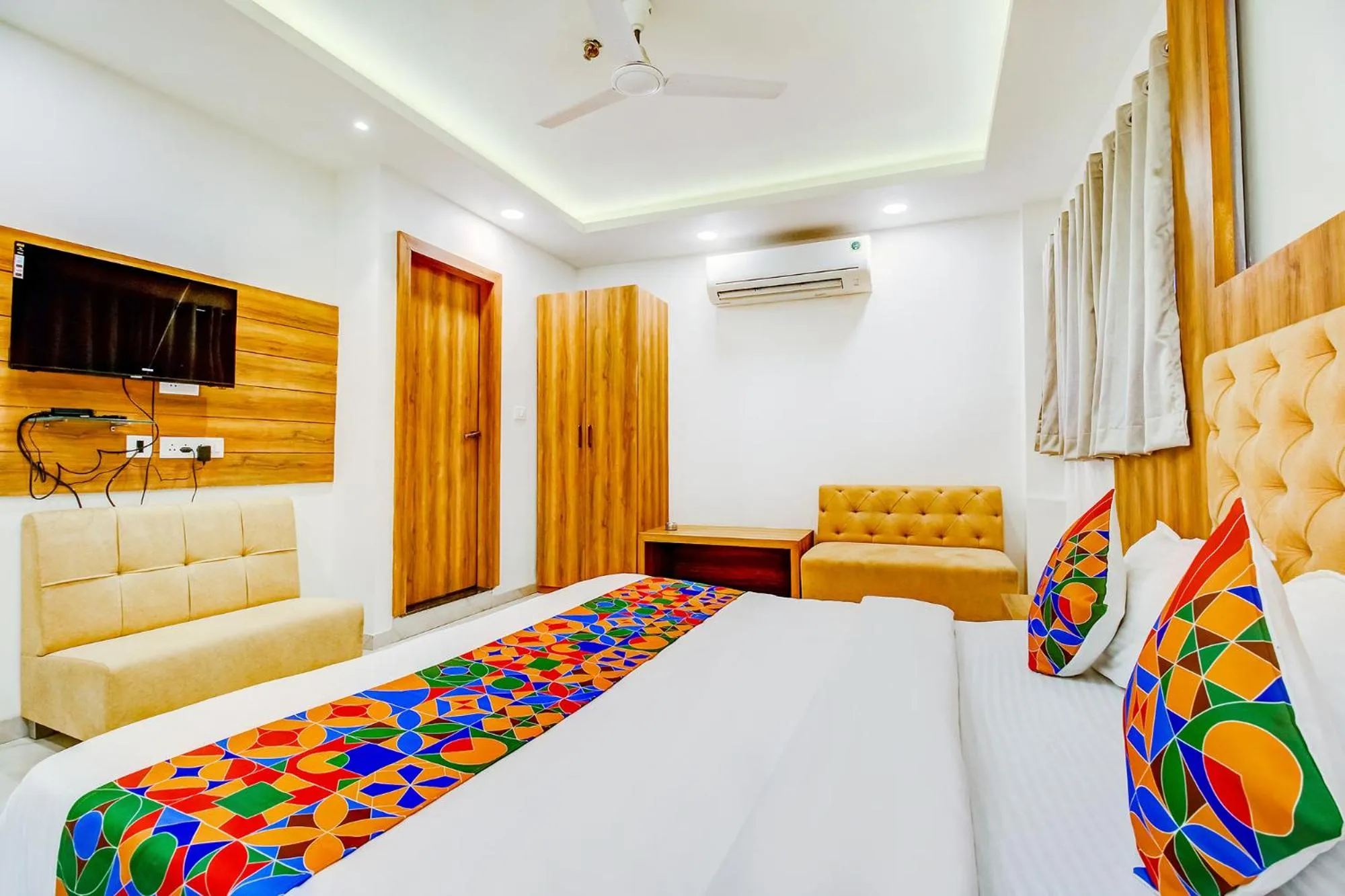 Bed in FabHotel Prime Purple Orchid