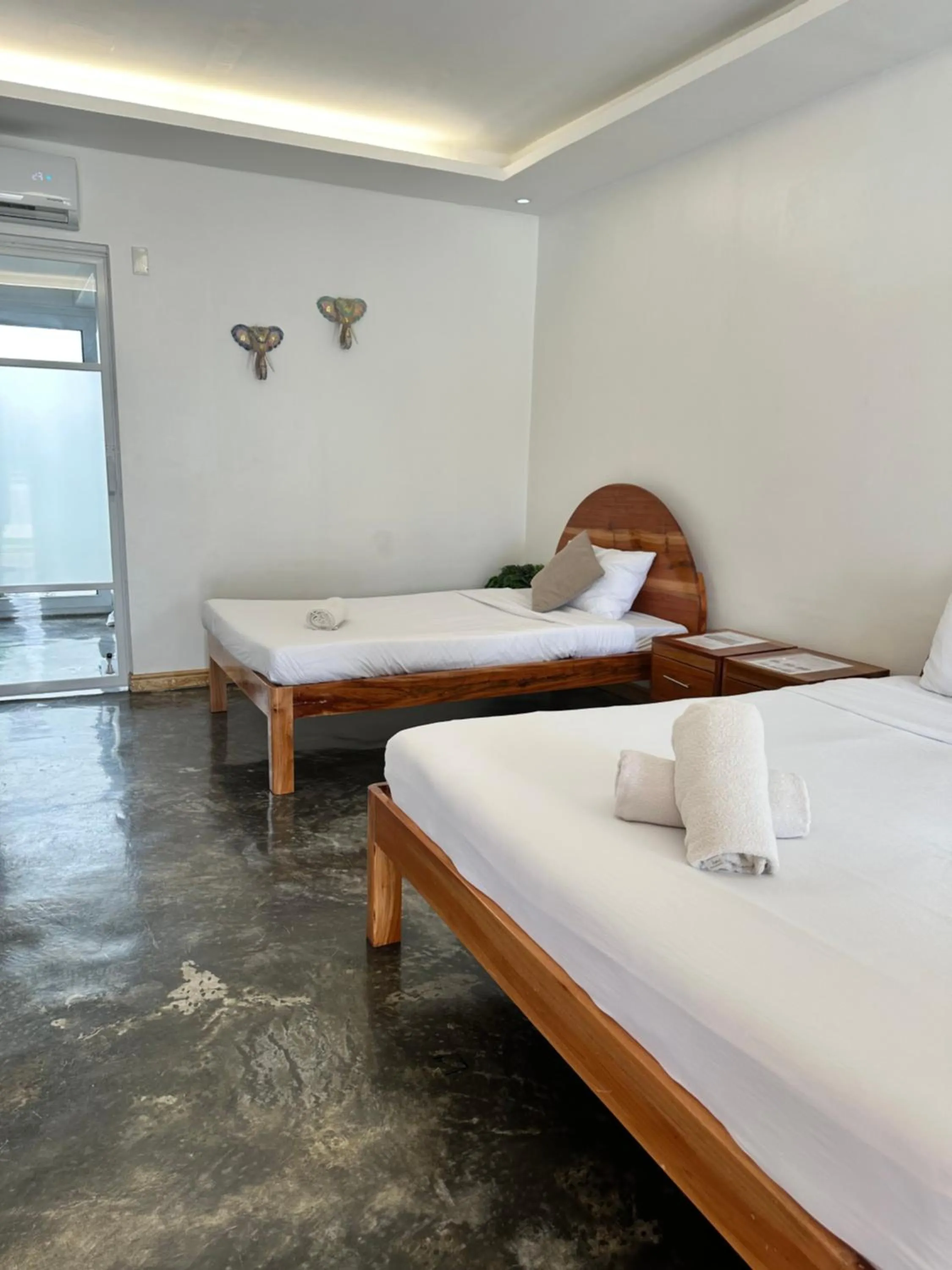 Bed in Treeshade Resort & Spa Moalboal