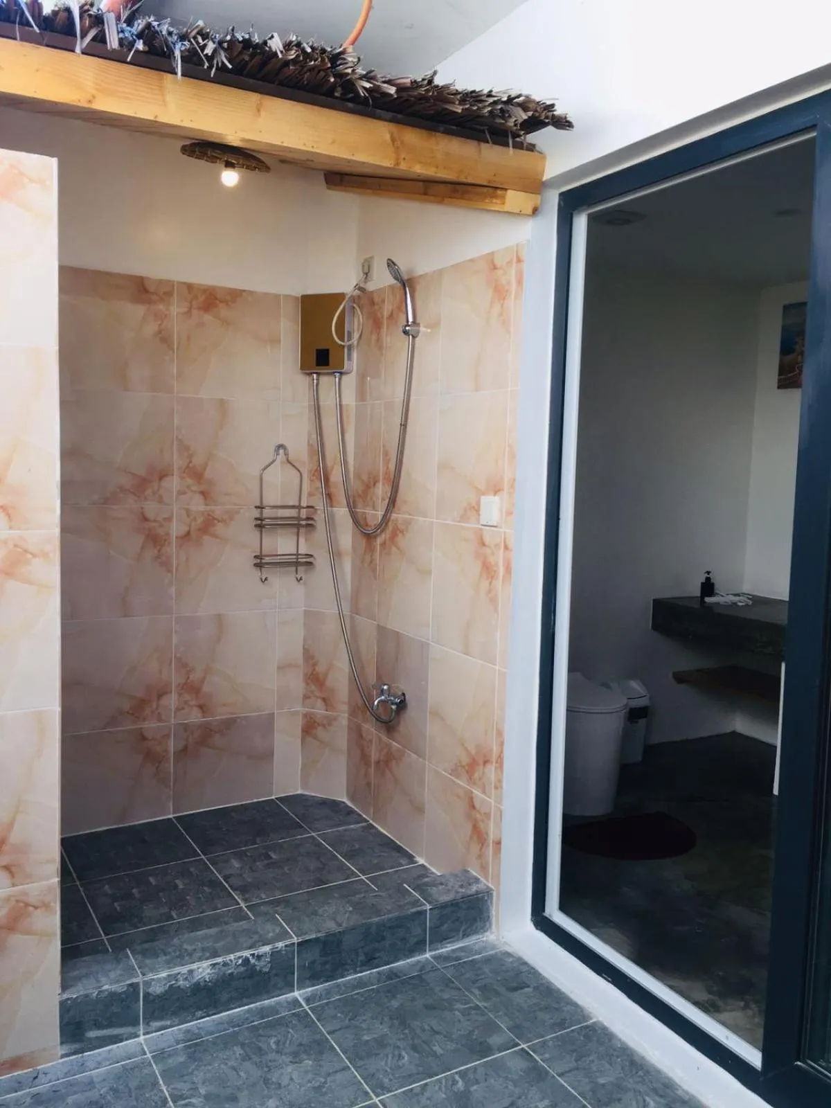 Shower in Treeshade Resort & Spa Moalboal