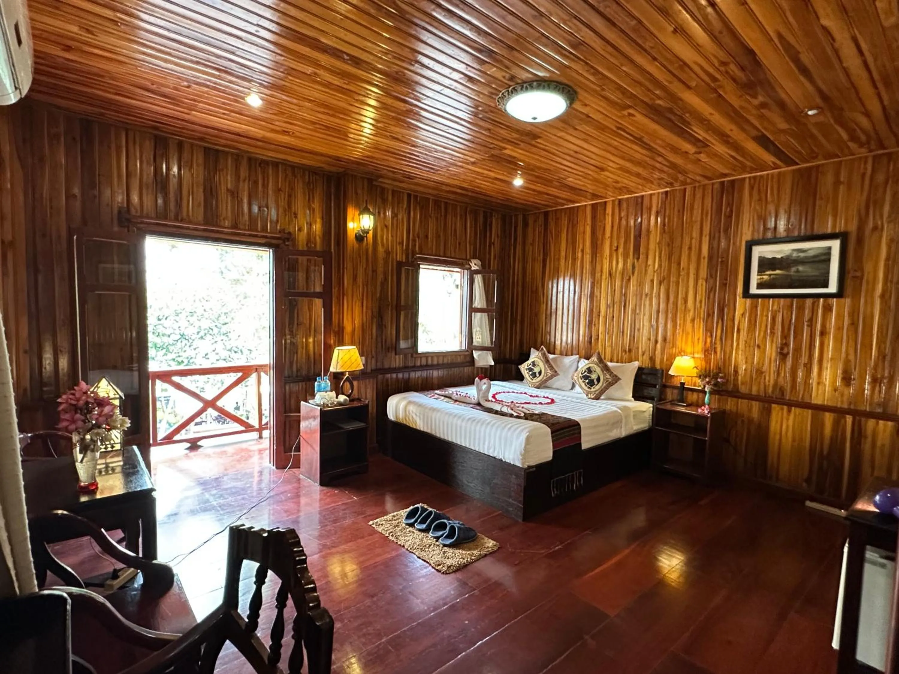 Bed in Villa Alounsavath Mekong Riverside