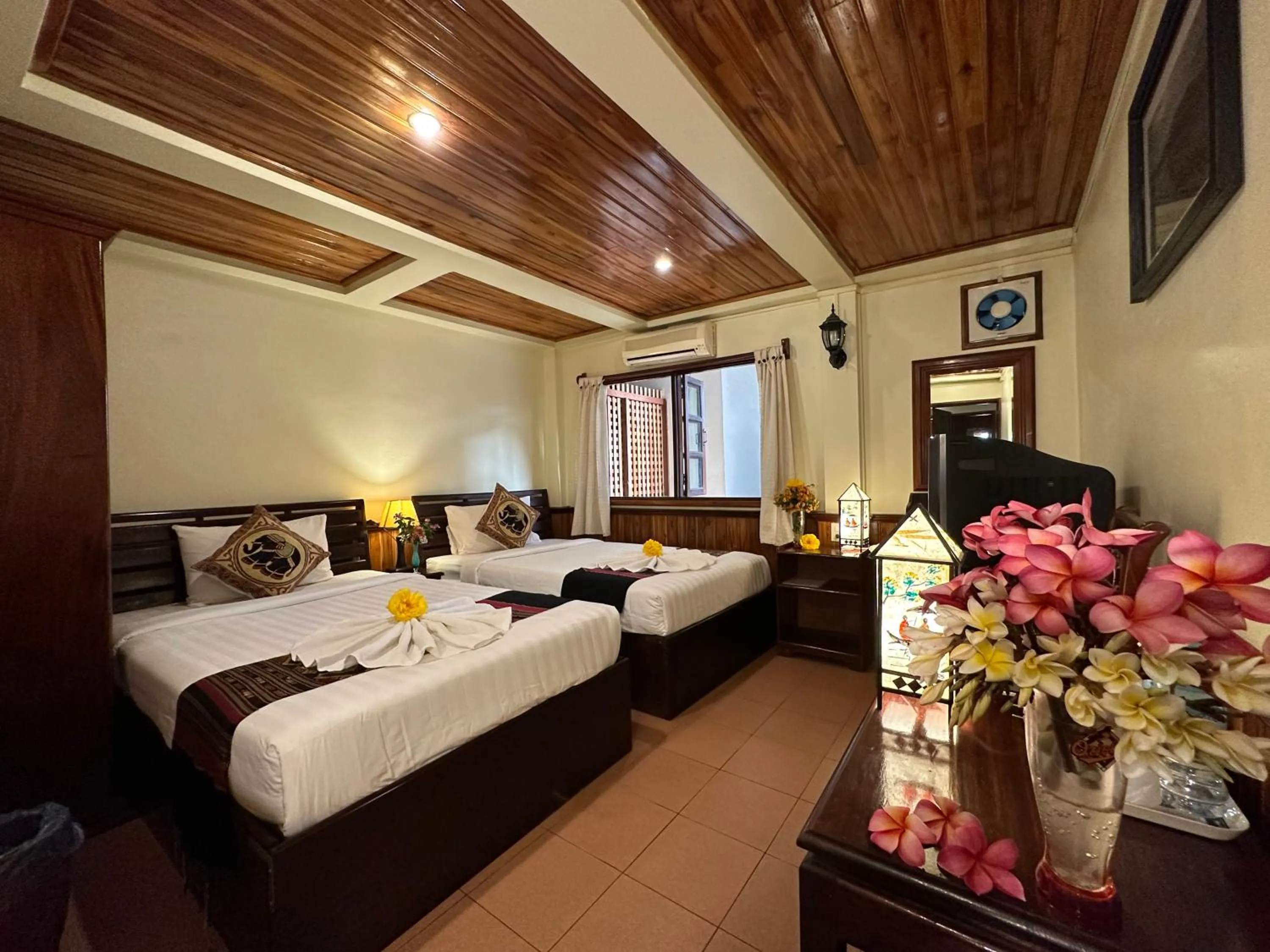 Bed in Villa Alounsavath Mekong Riverside