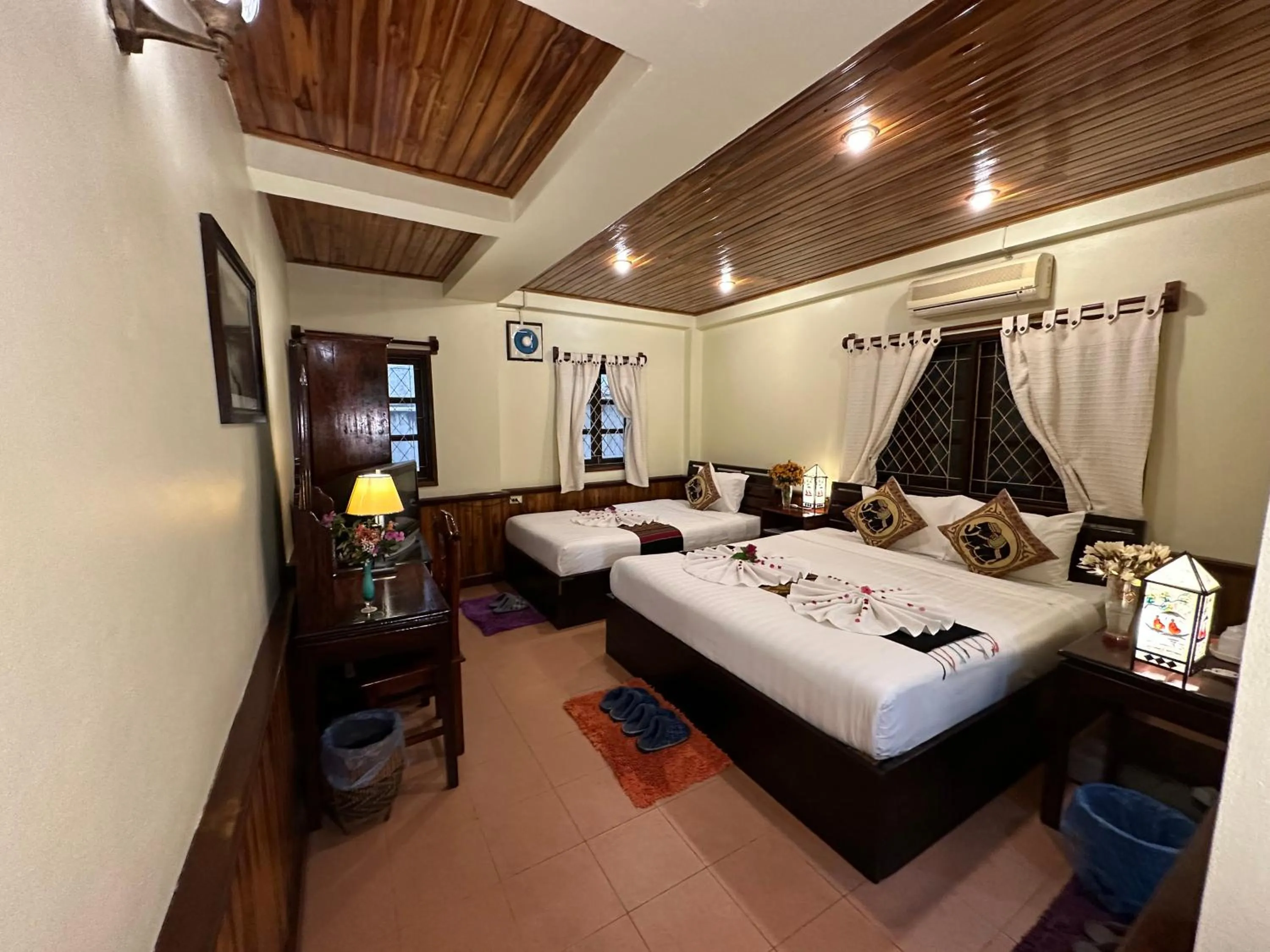 Bed in Villa Alounsavath Mekong Riverside