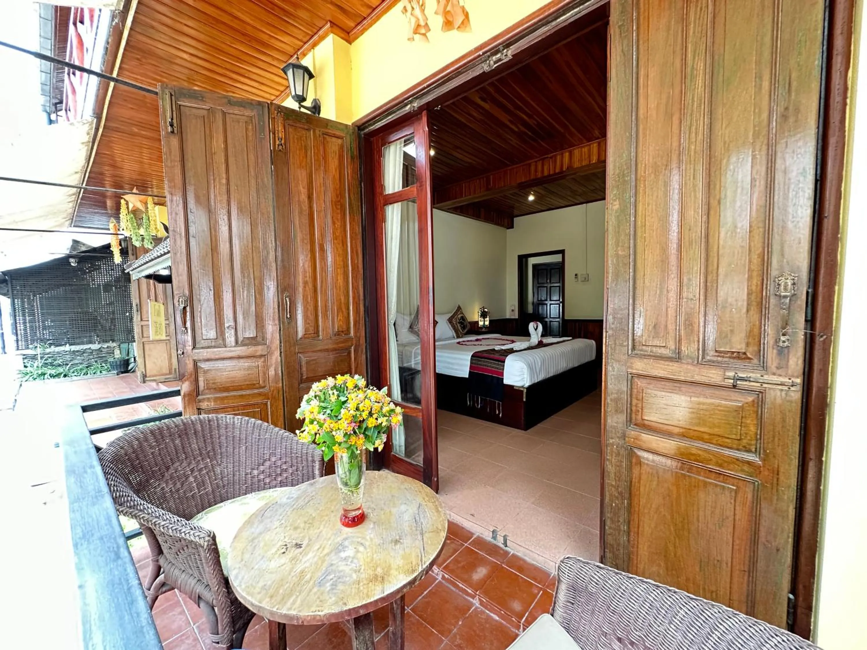 Bed in Villa Alounsavath Mekong Riverside