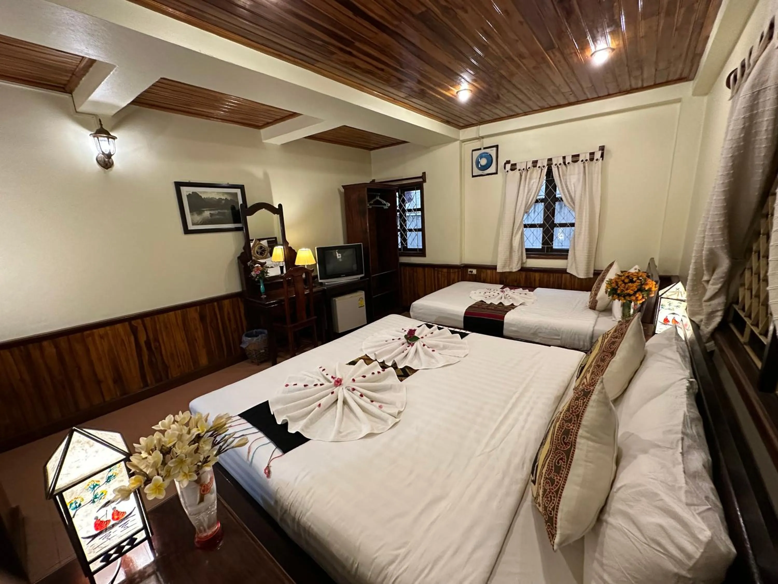 Bed in Villa Alounsavath Mekong Riverside