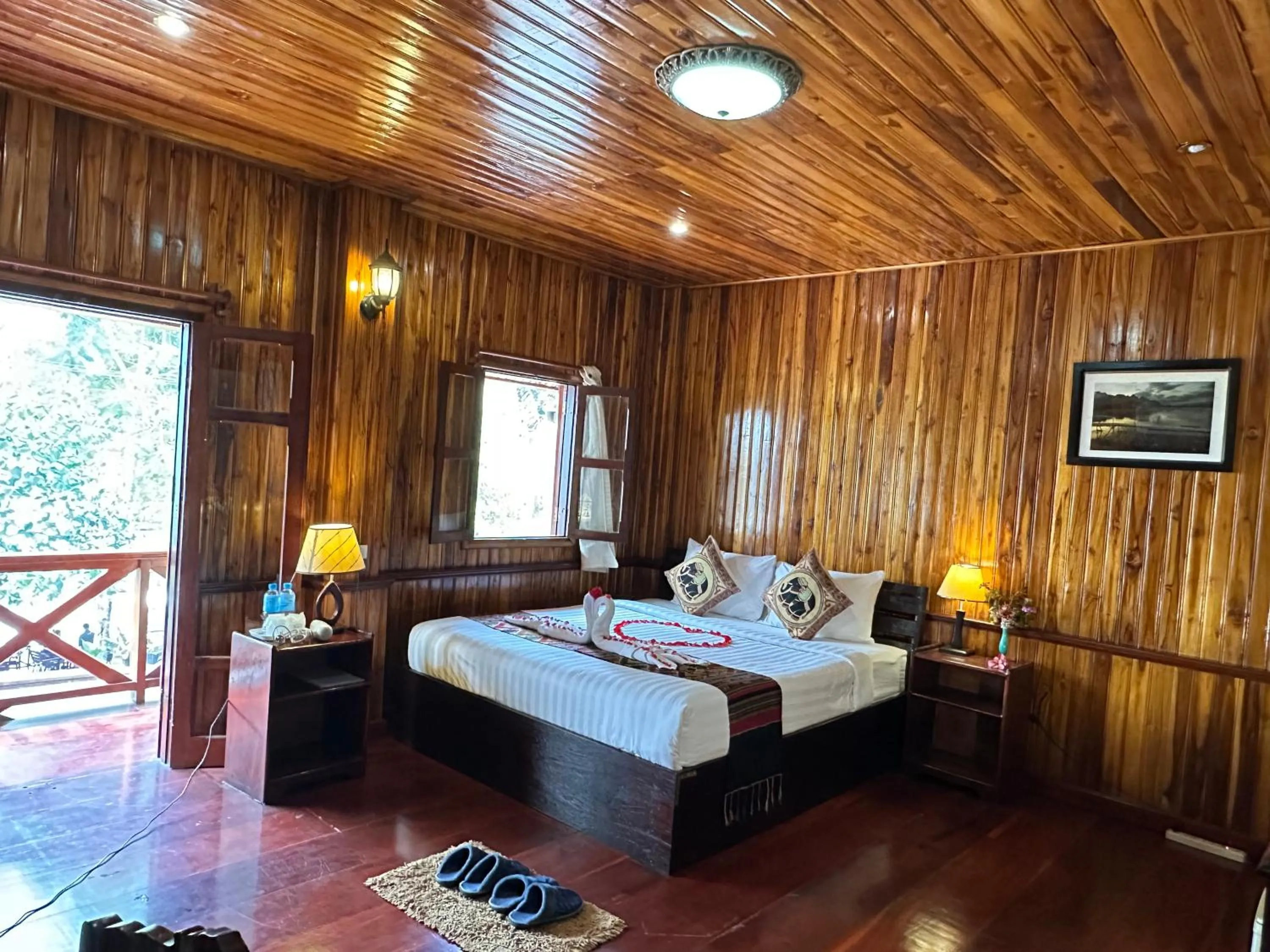 Living room, Bed in Villa Alounsavath Mekong Riverside
