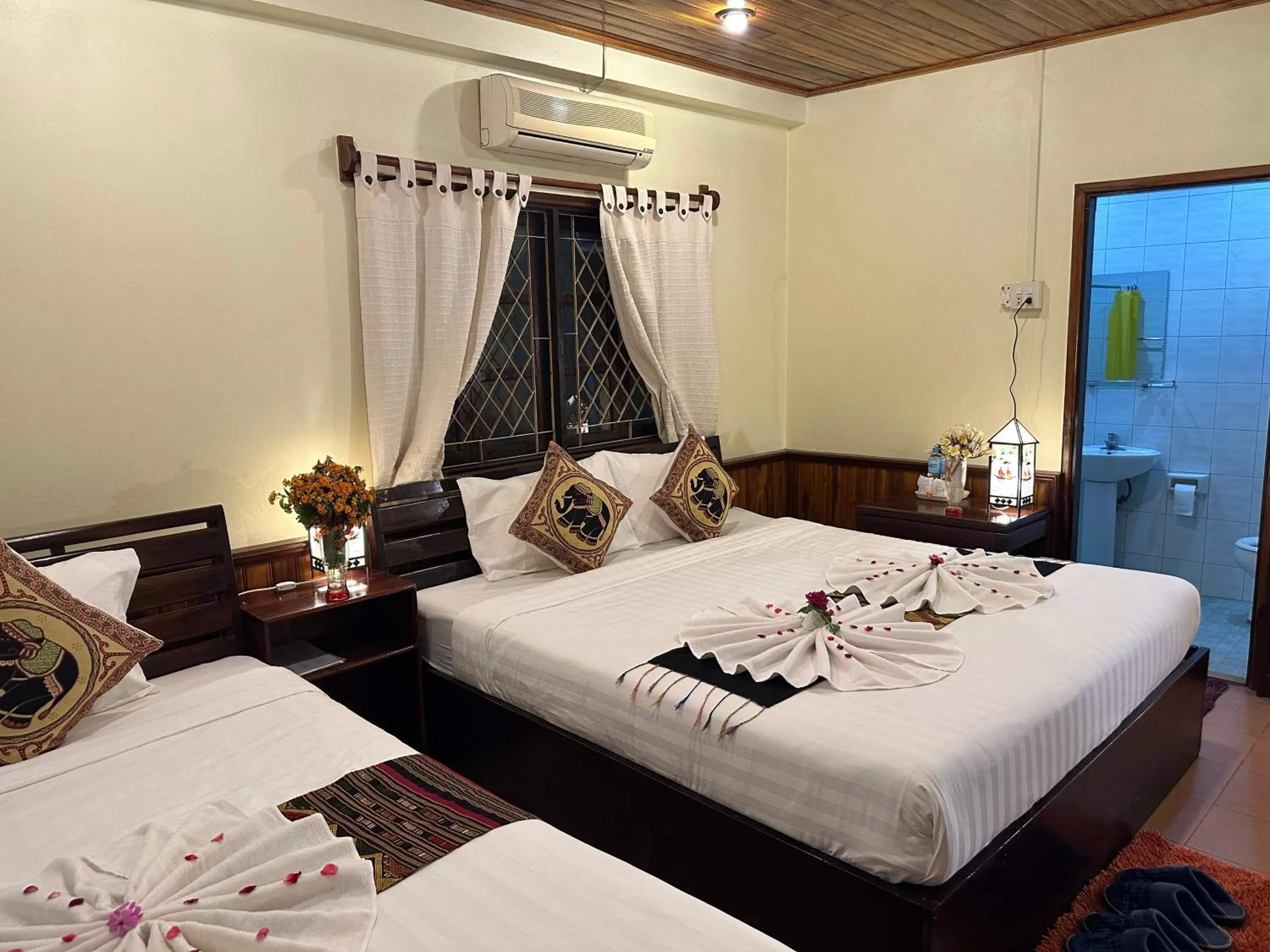 Photo of the whole room, Bed in Villa Alounsavath Mekong Riverside