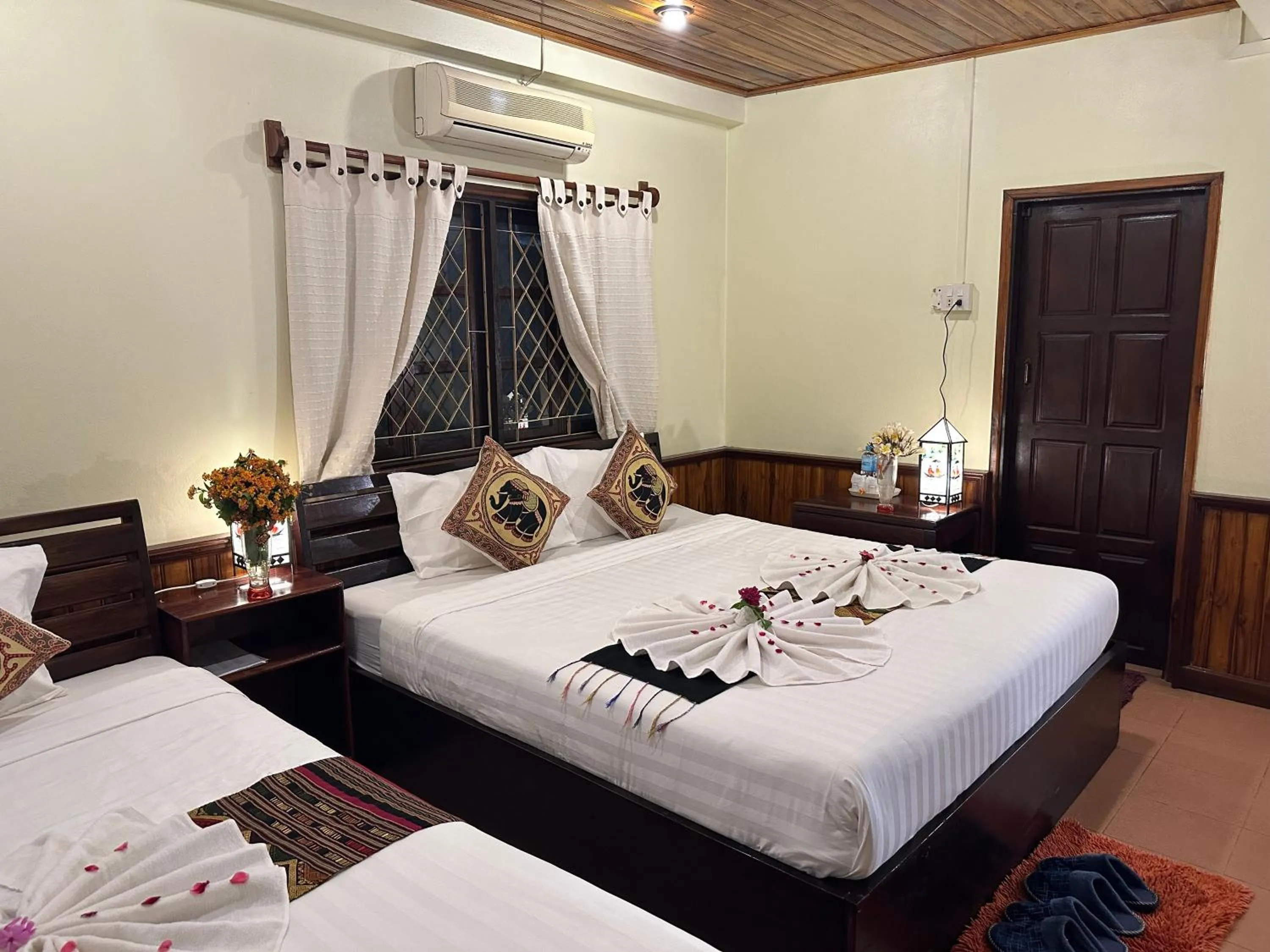 Photo of the whole room, Bed in Villa Alounsavath Mekong Riverside