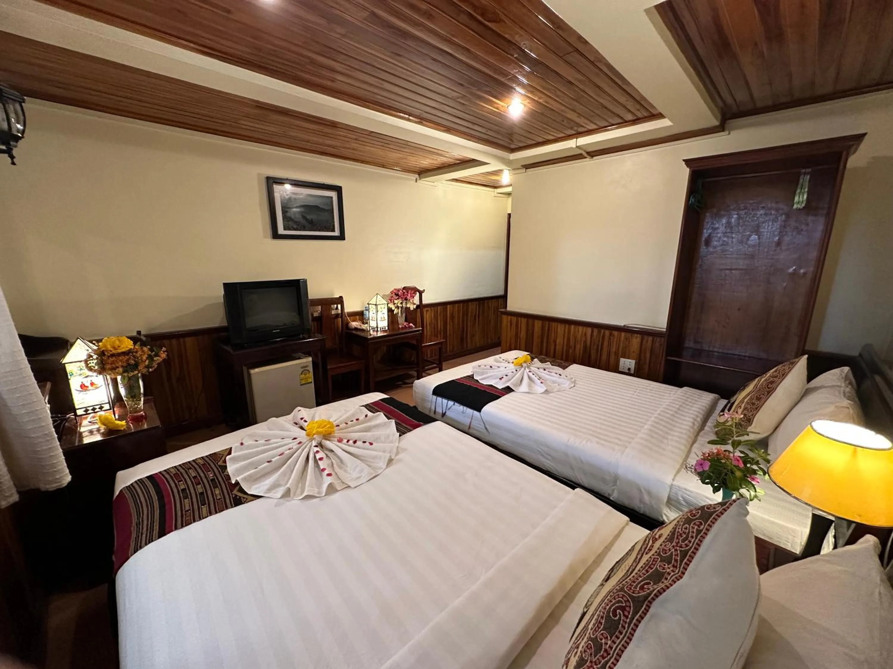 Bed in Villa Alounsavath Mekong Riverside