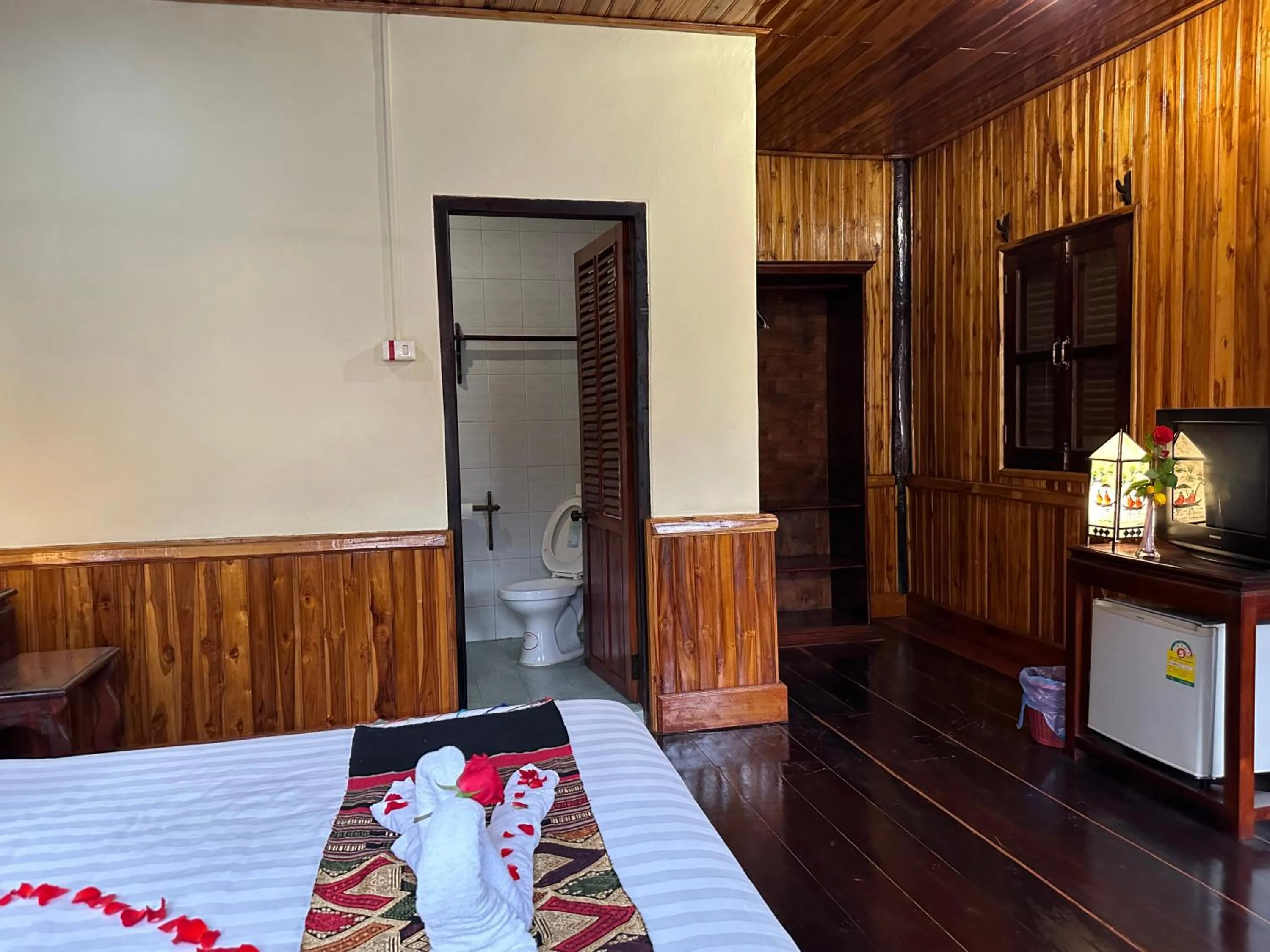 Bed in Villa Alounsavath Mekong Riverside