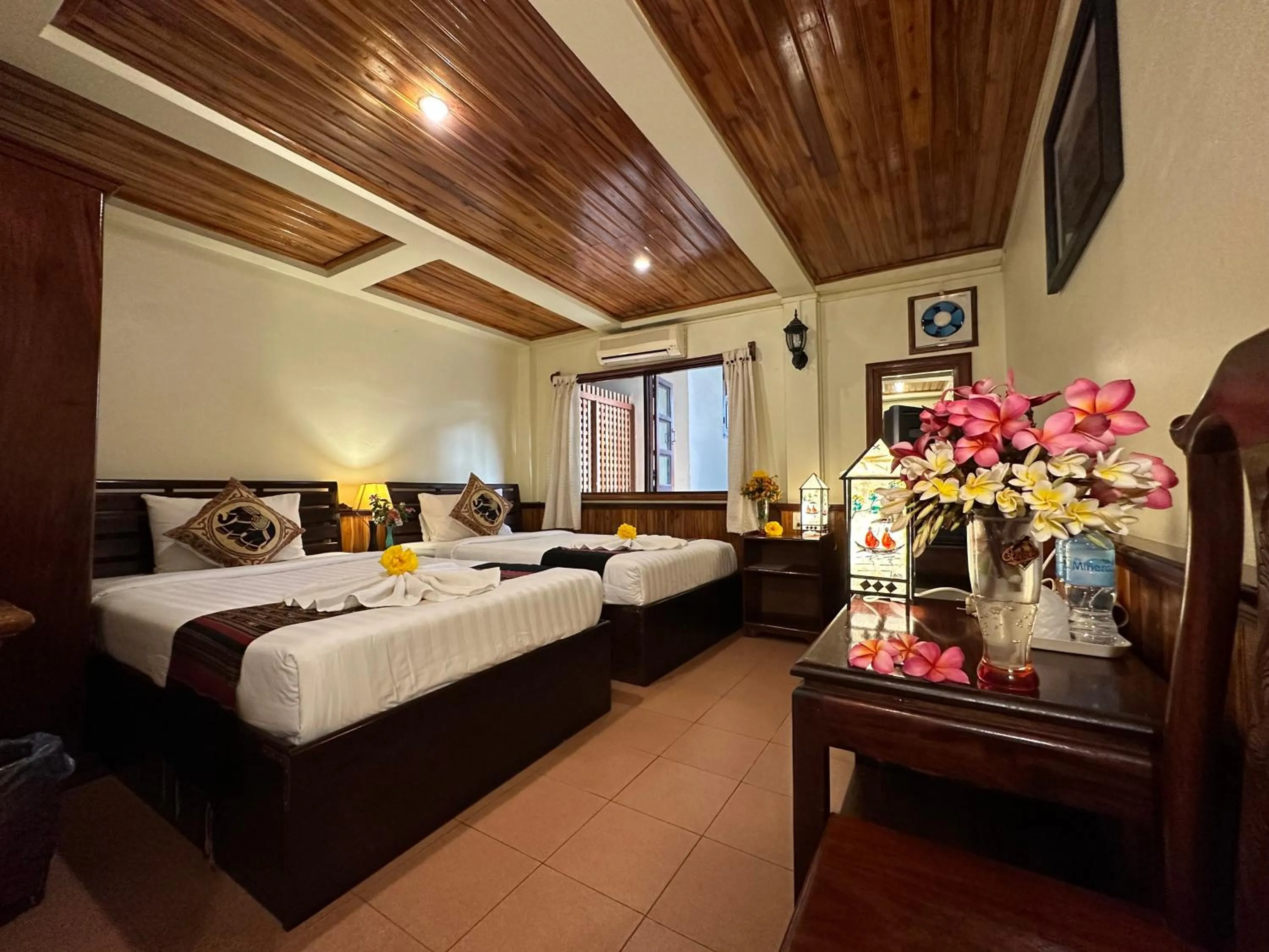 Bed in Villa Alounsavath Mekong Riverside
