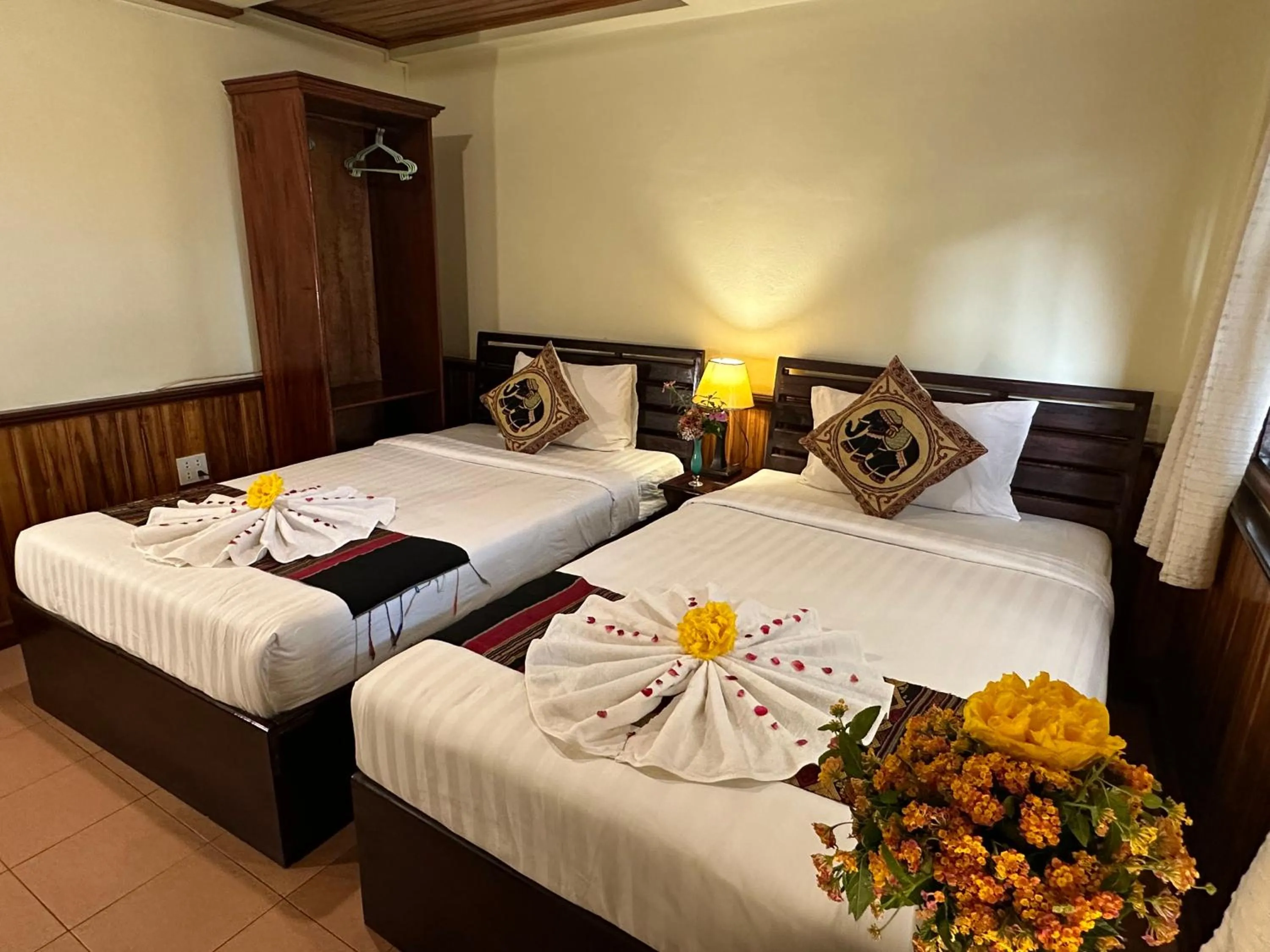 Bed in Villa Alounsavath Mekong Riverside