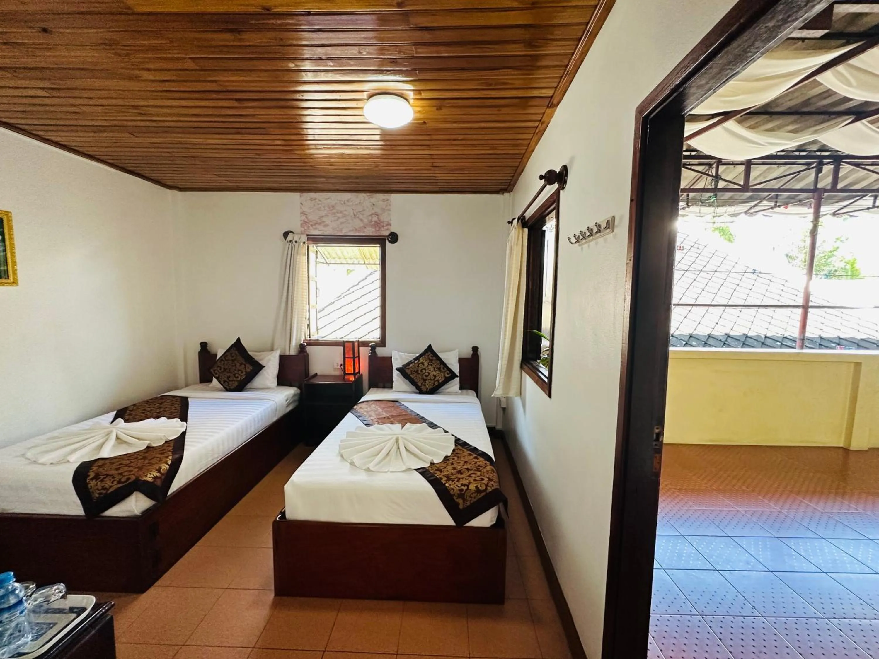 Bed in Villa Alounsavath Mekong Riverside