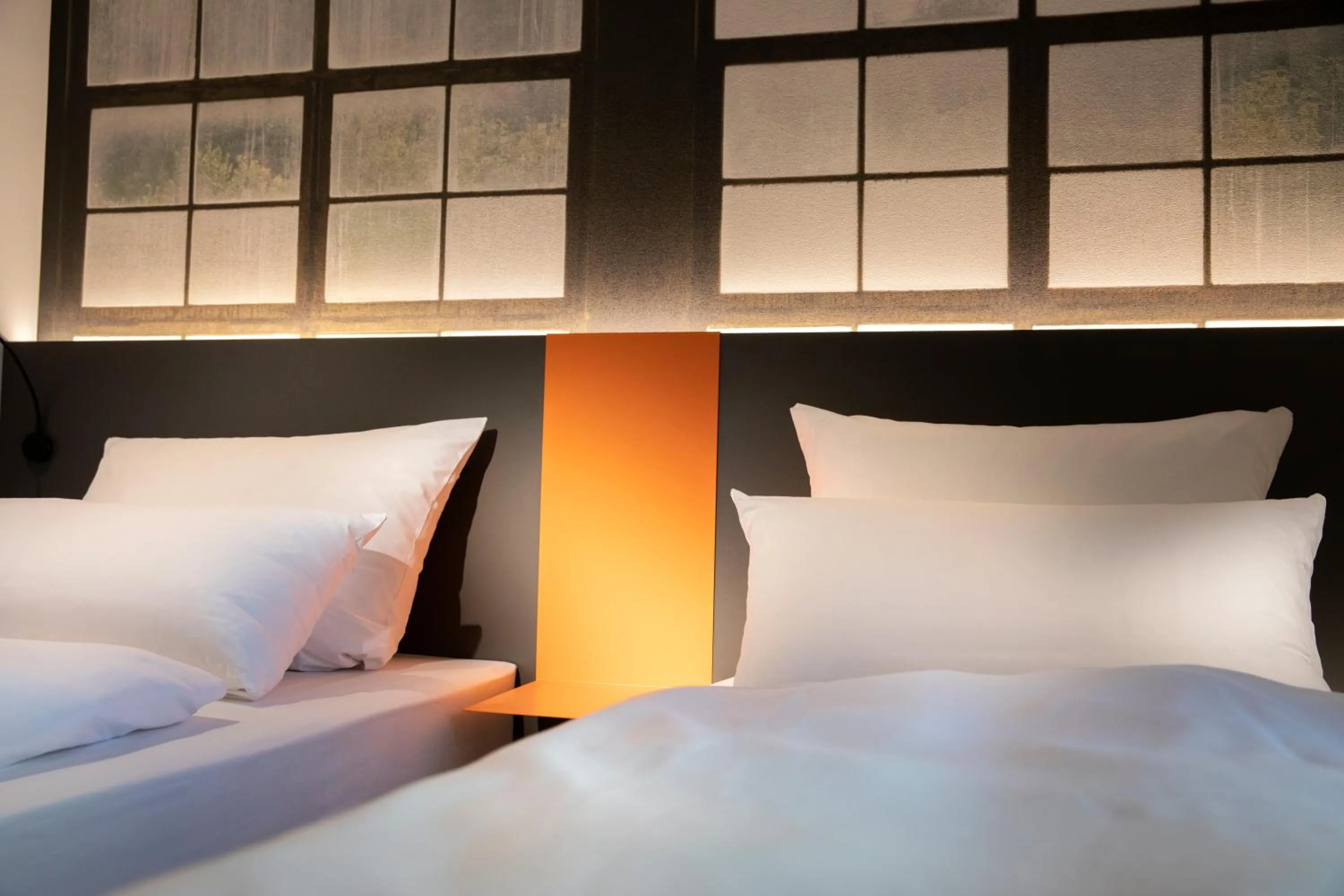 Bed in LOGINN Hotel Waiblingen