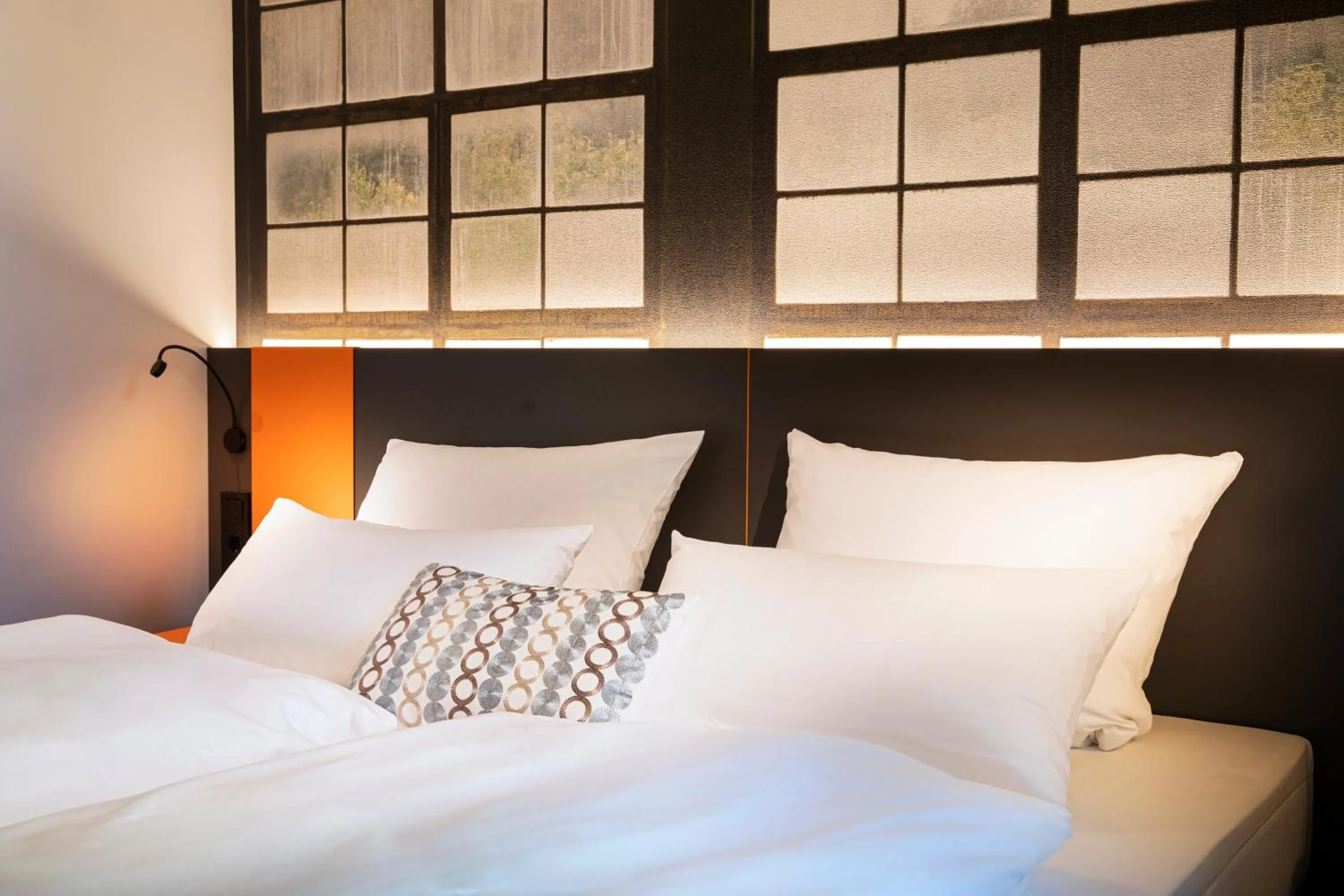 Bed in LOGINN Hotel Waiblingen