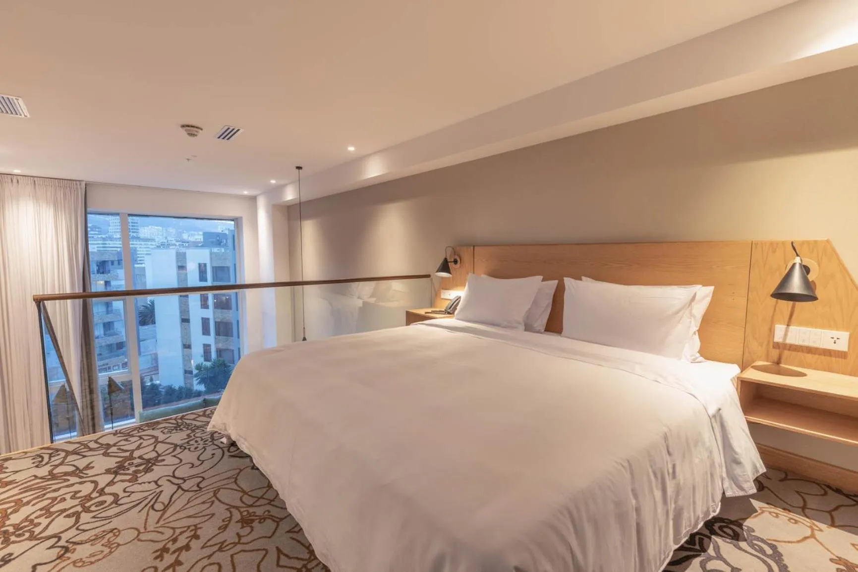 Bed in GO Quito Hotel