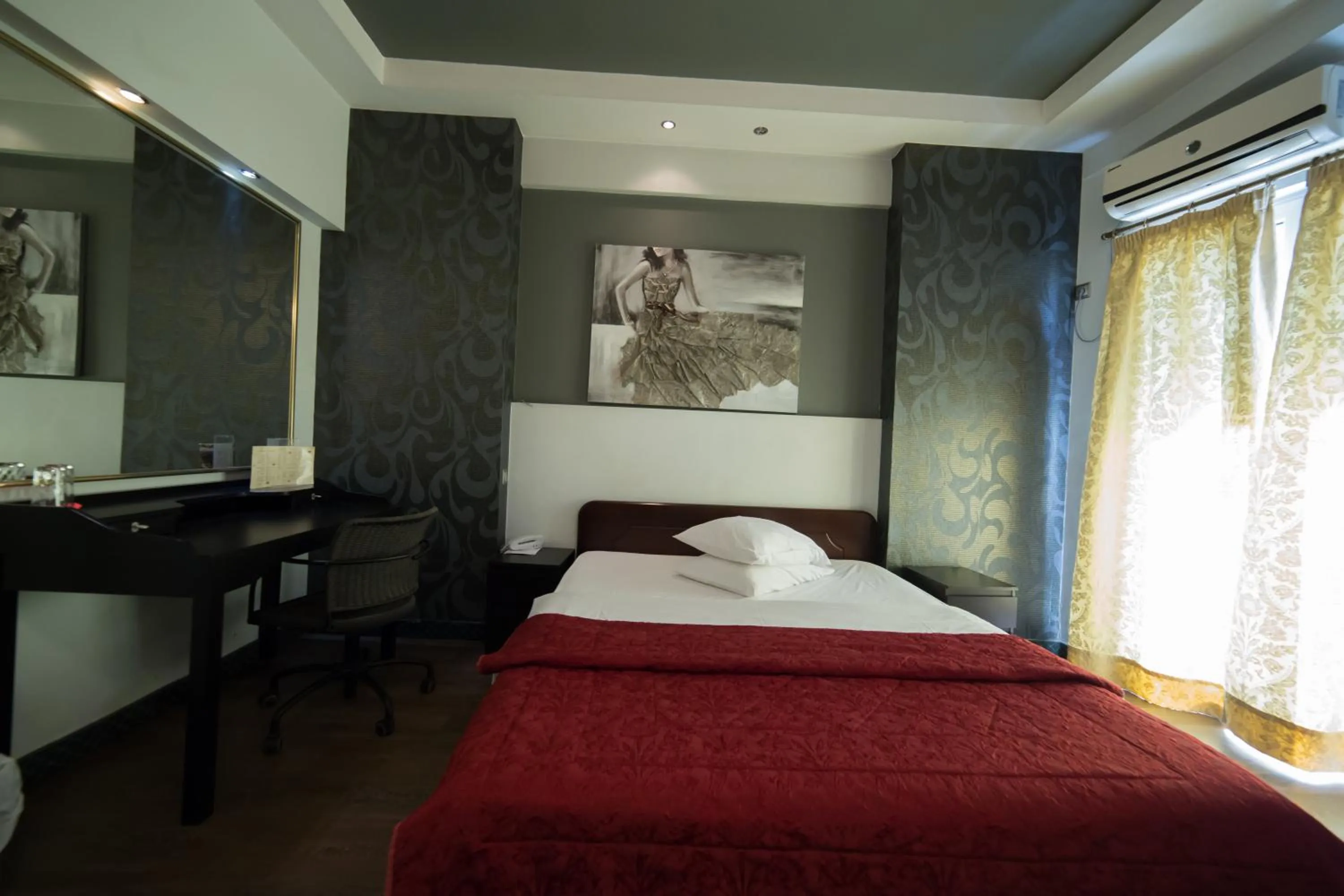 Bed in Minoa Athens Hotel