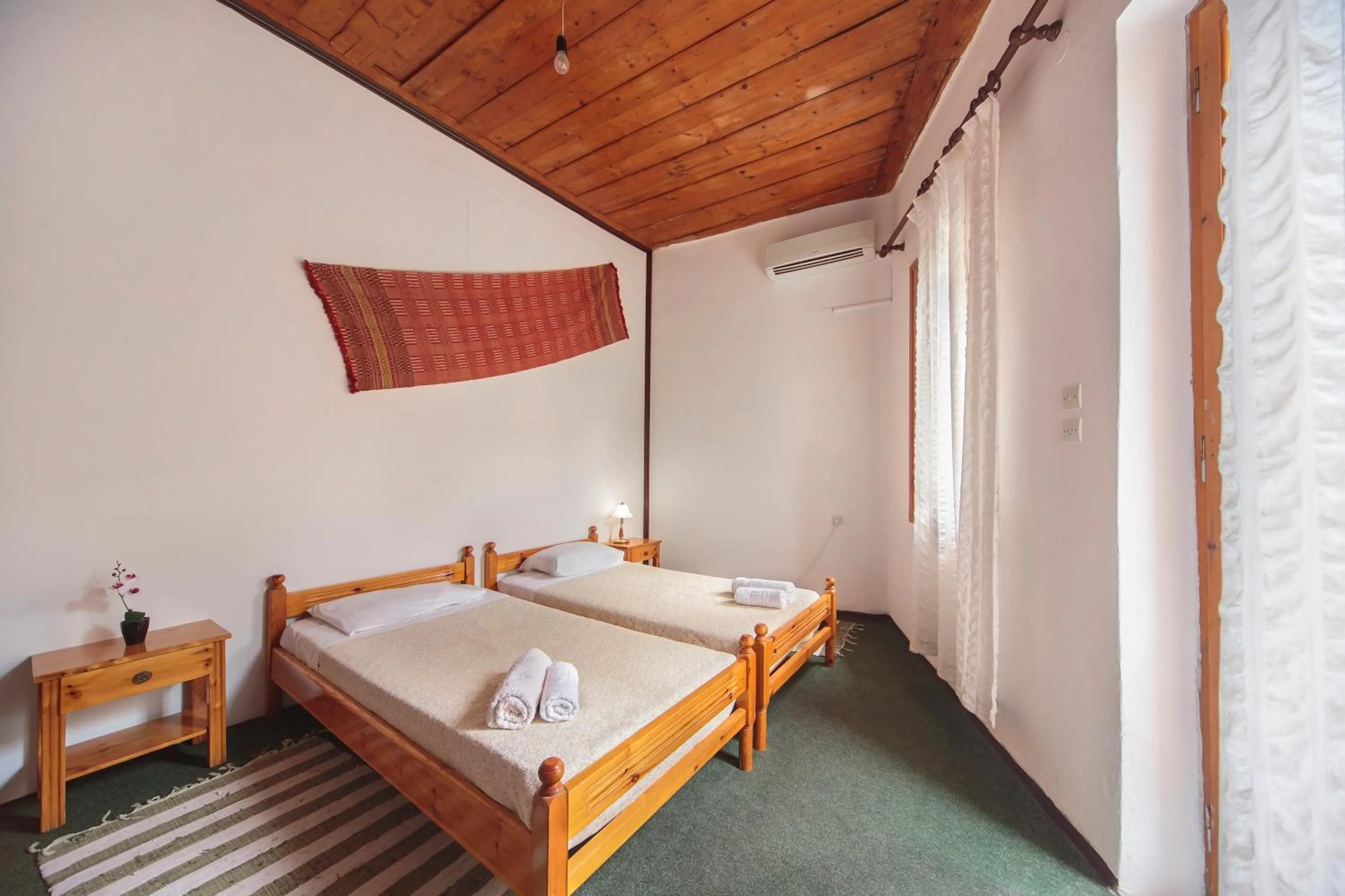 Bedroom in KasteliSuites