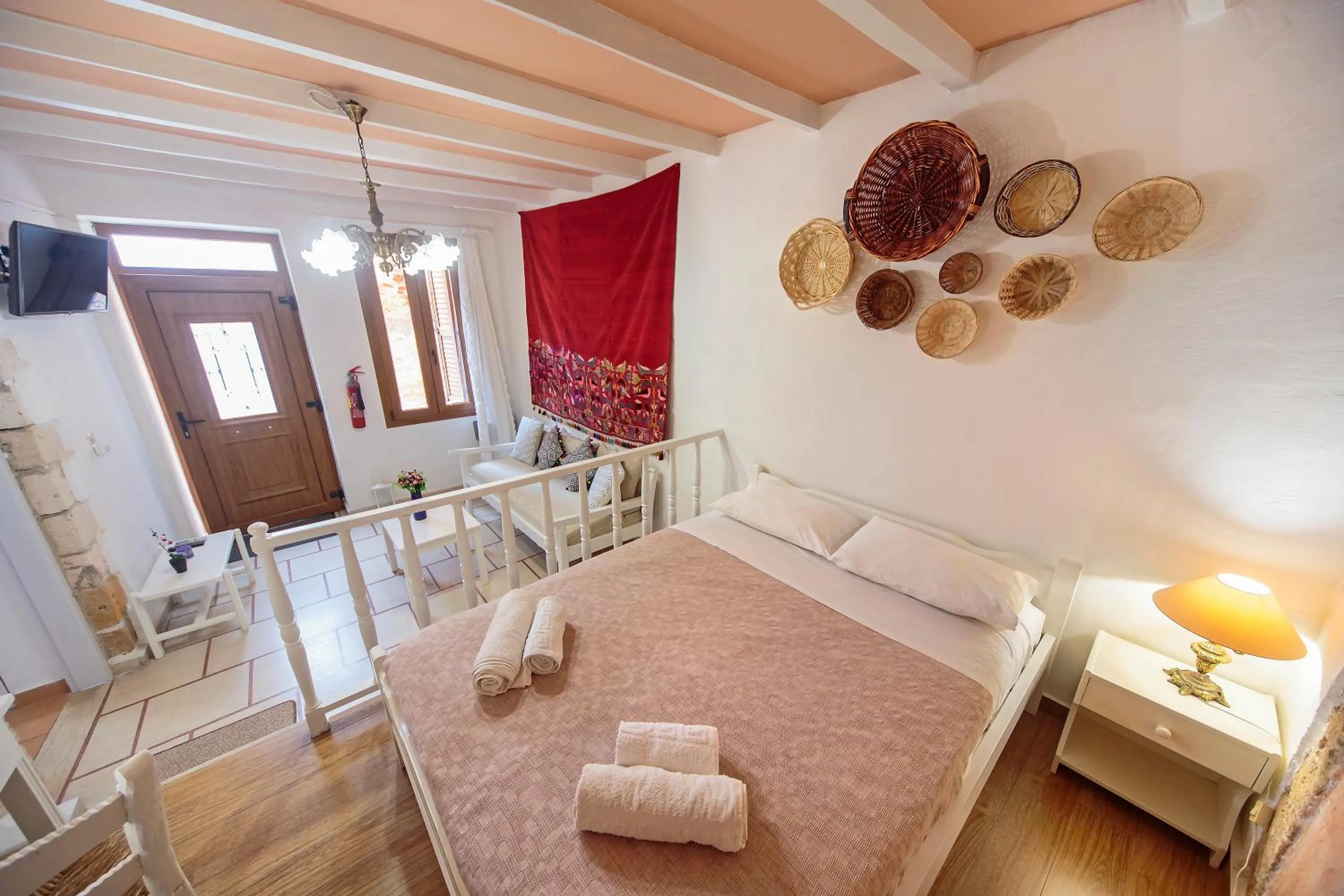 Bedroom in KasteliSuites