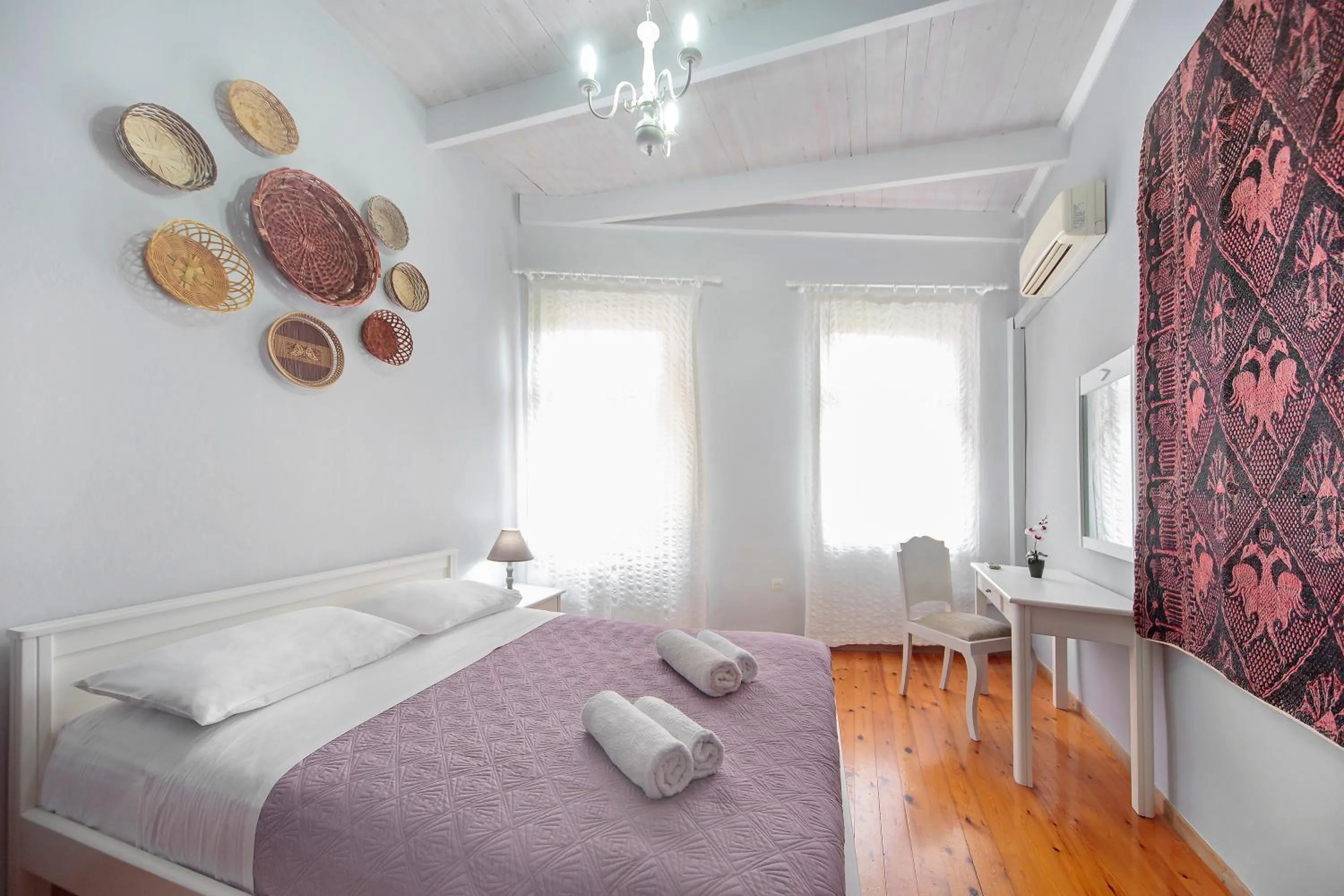 Bedroom in KasteliSuites