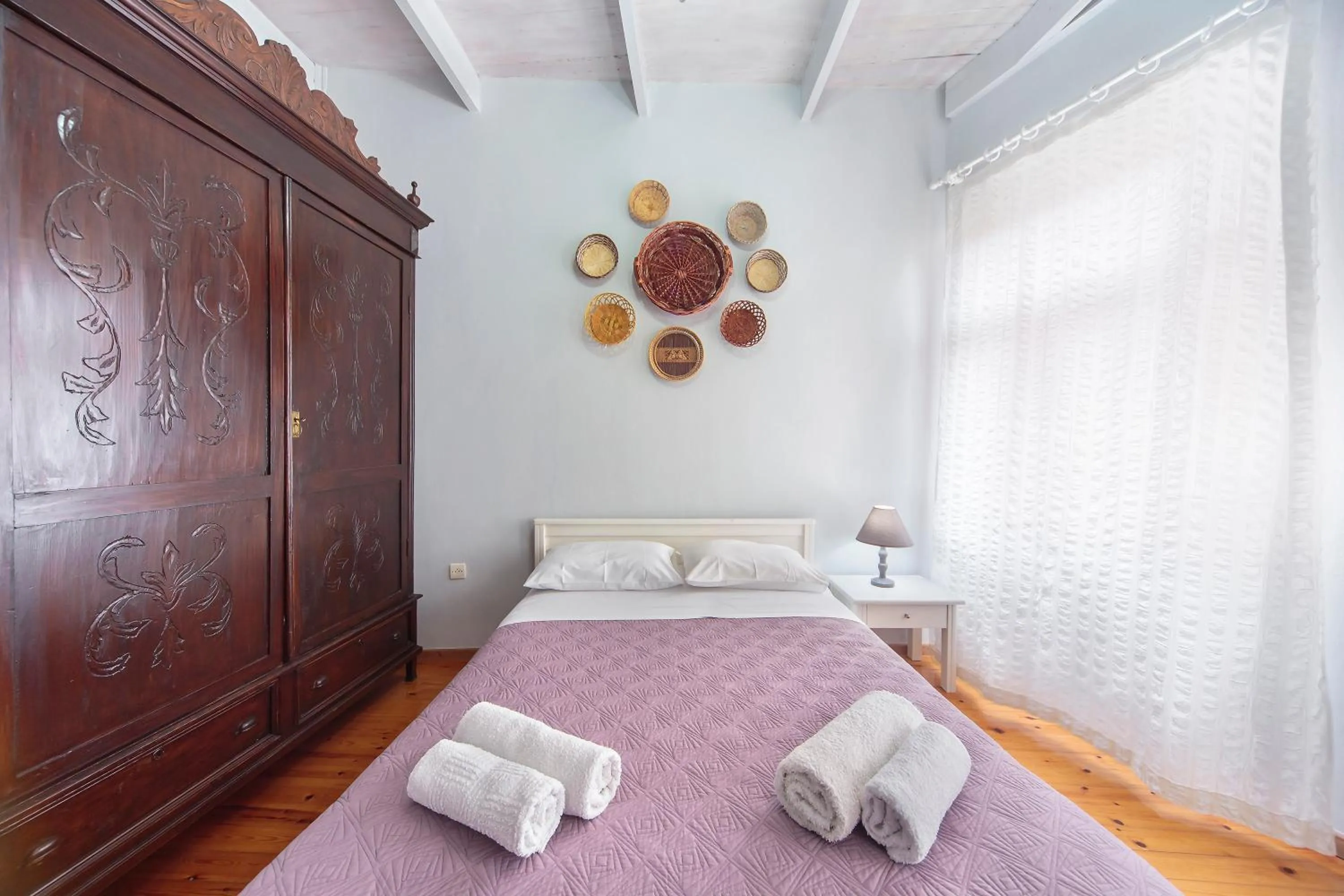 Bedroom in KasteliSuites