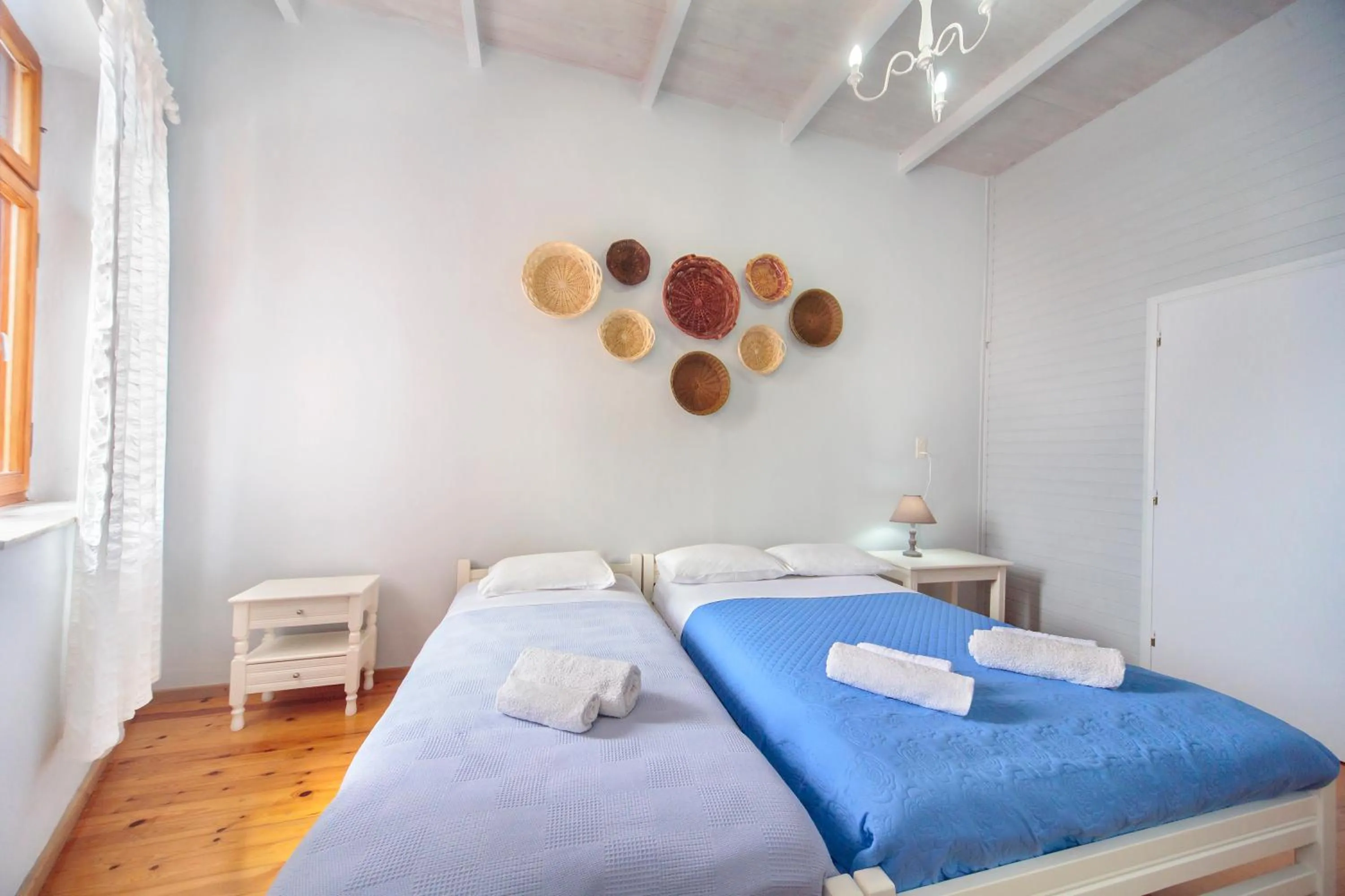 Bedroom in KasteliSuites