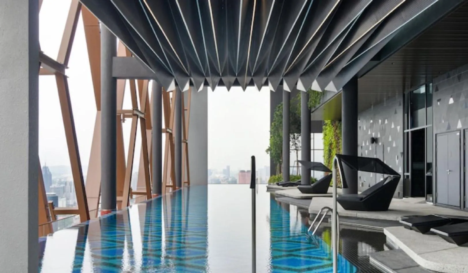 Swimming pool in Scarletz Suites KLCC Twin Tower by Purple Orchid