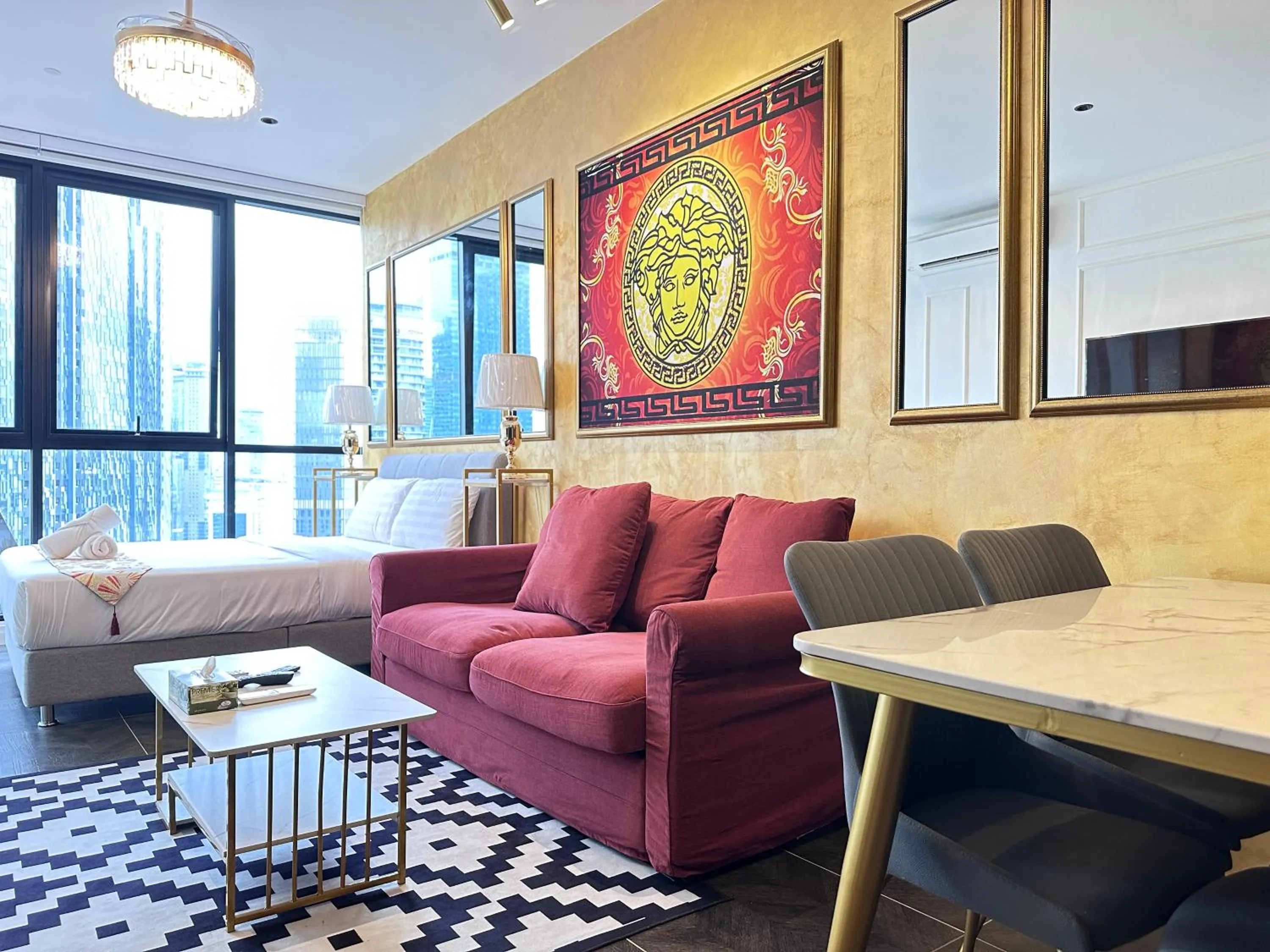 Living room in Scarletz Suites KLCC Twin Tower by Purple Orchid