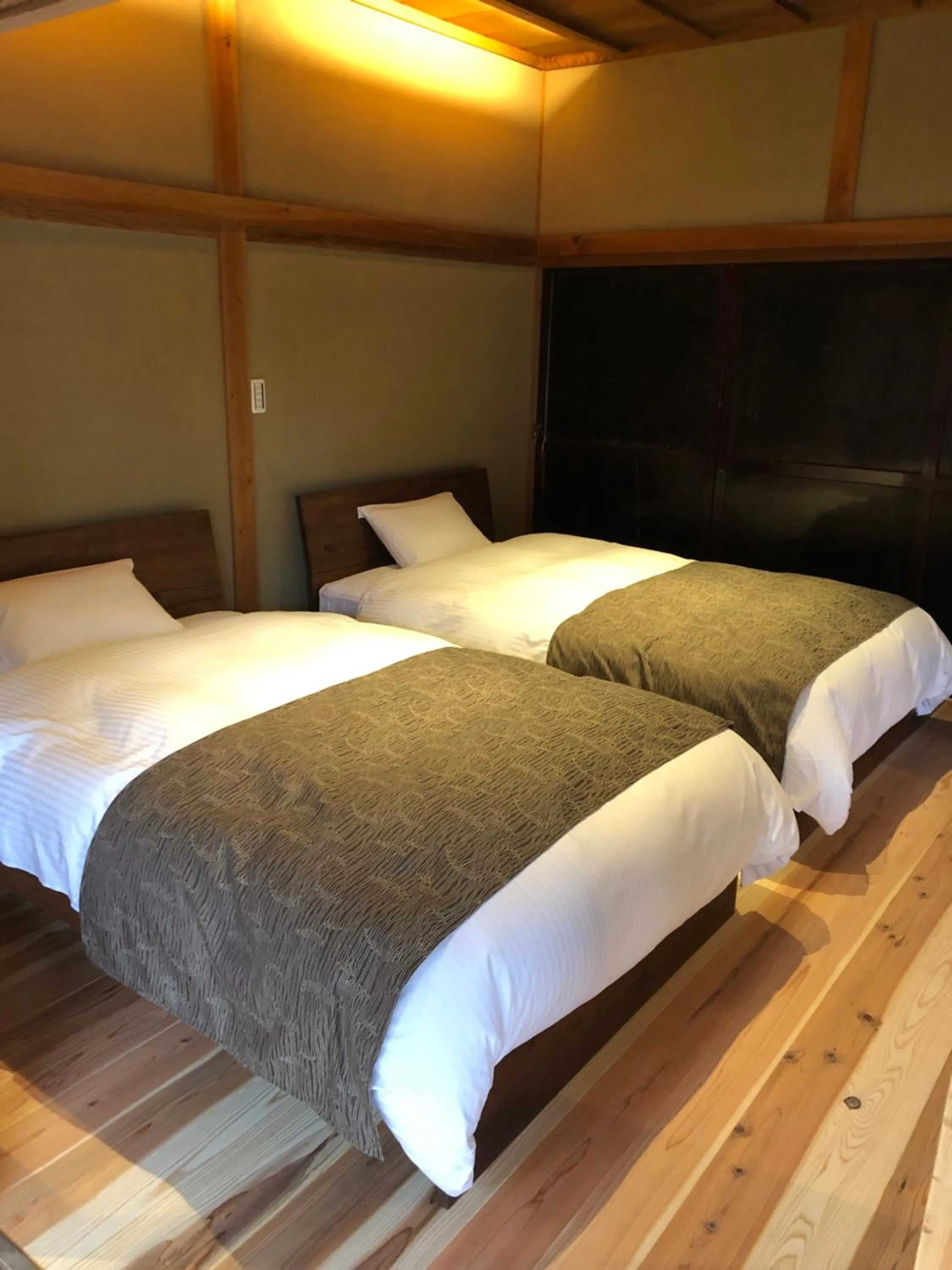 Bed in Satoyama Hotel Kanenone Tamba