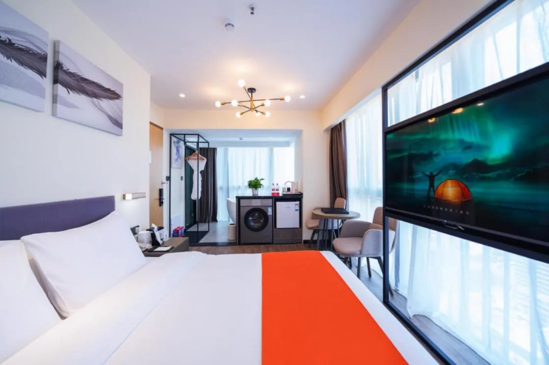 Bed in Shenzhen Kingkey Kingyu Hotel