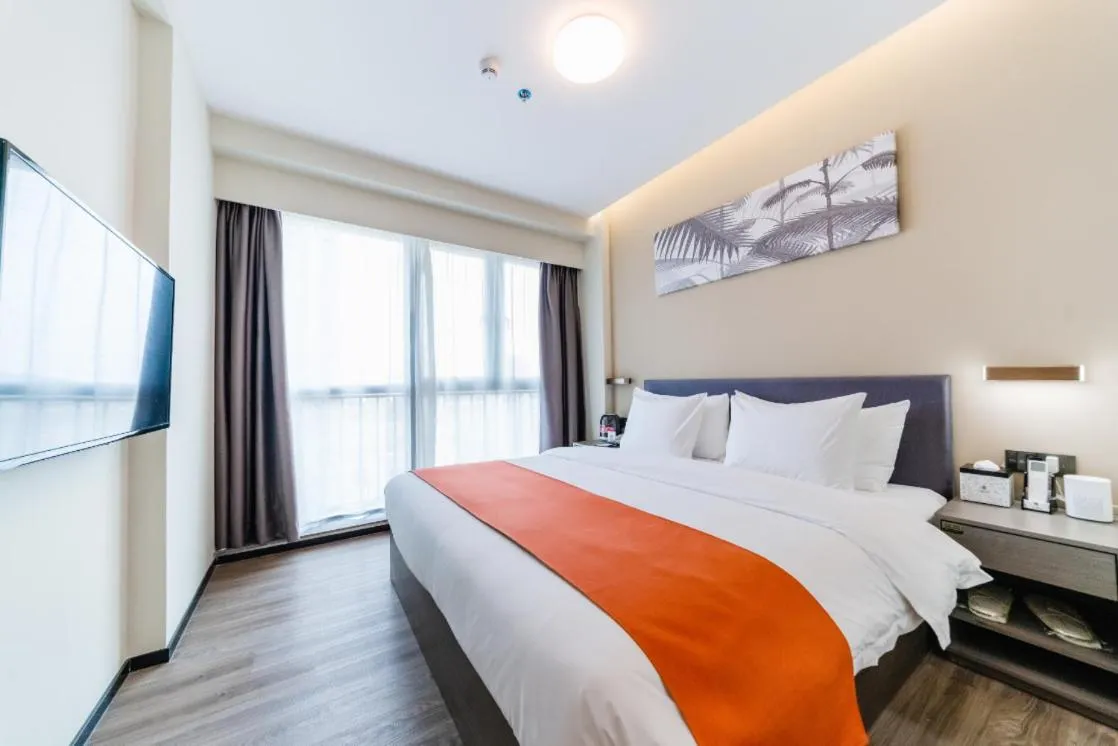Bed in Shenzhen Kingkey Kingyu Hotel