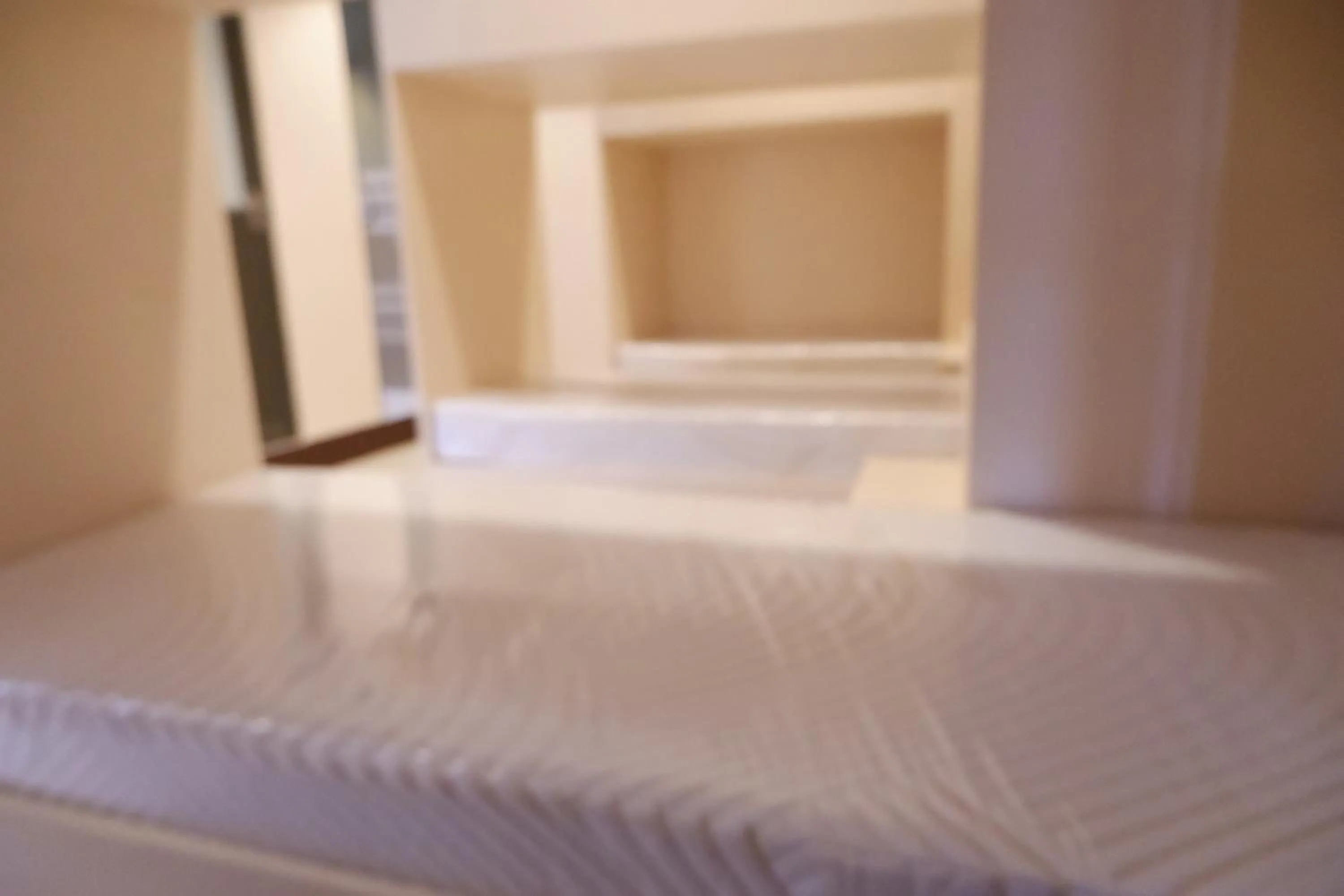 Bed in FB Budgetel Suites