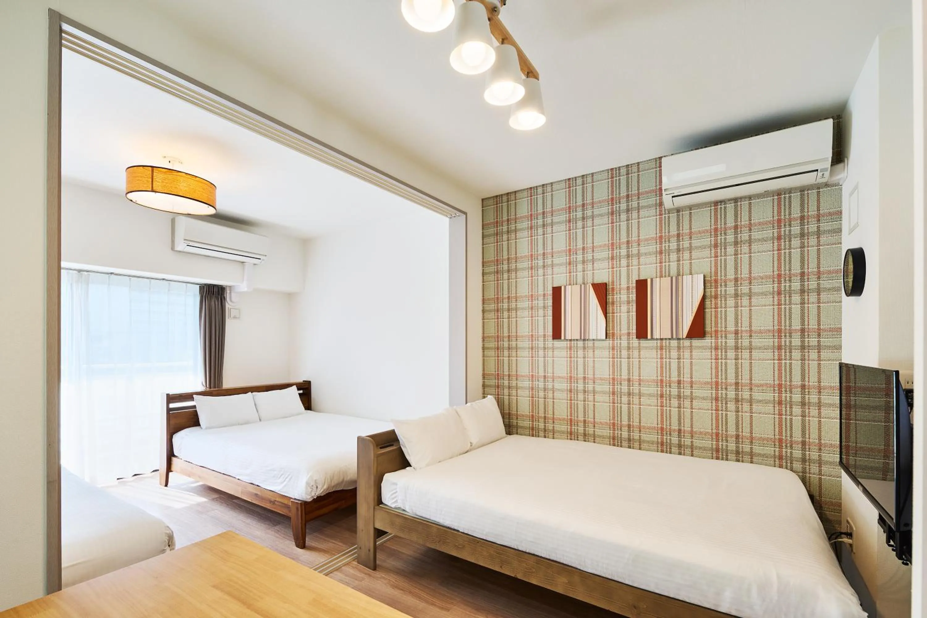 Bed in ALFACIO RIVERSIDE STAY HAKATA