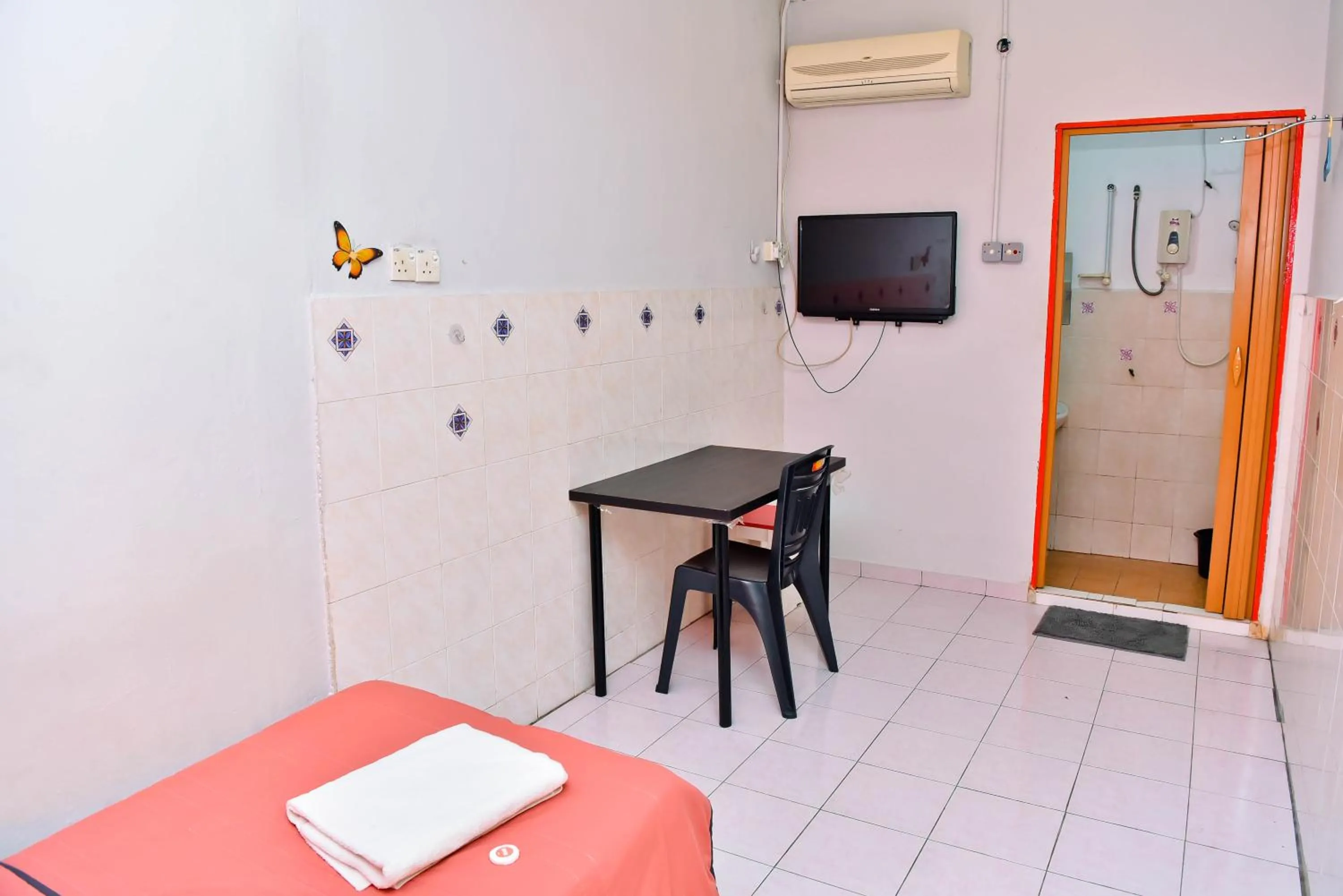 Bed in T FAMILY HOTEL