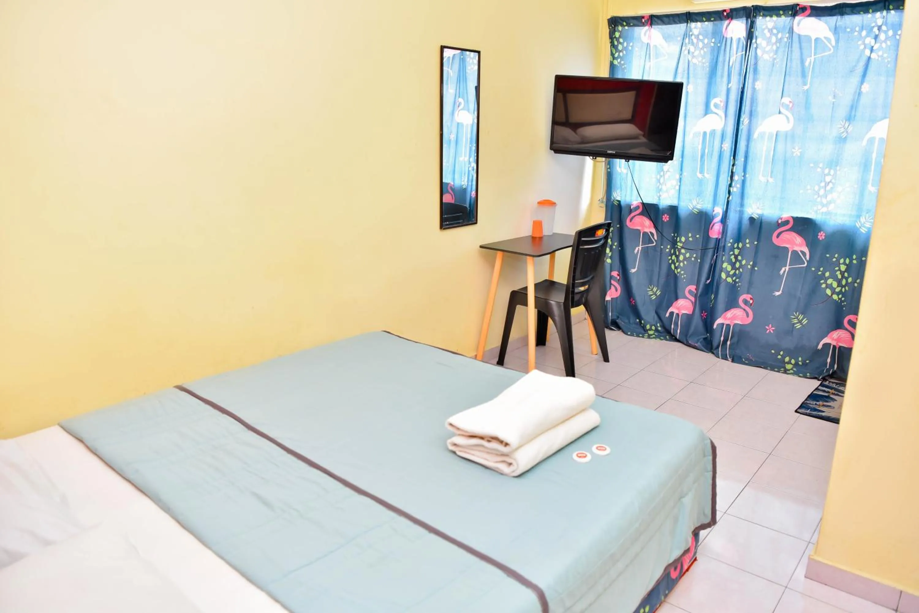 Bed in T FAMILY HOTEL