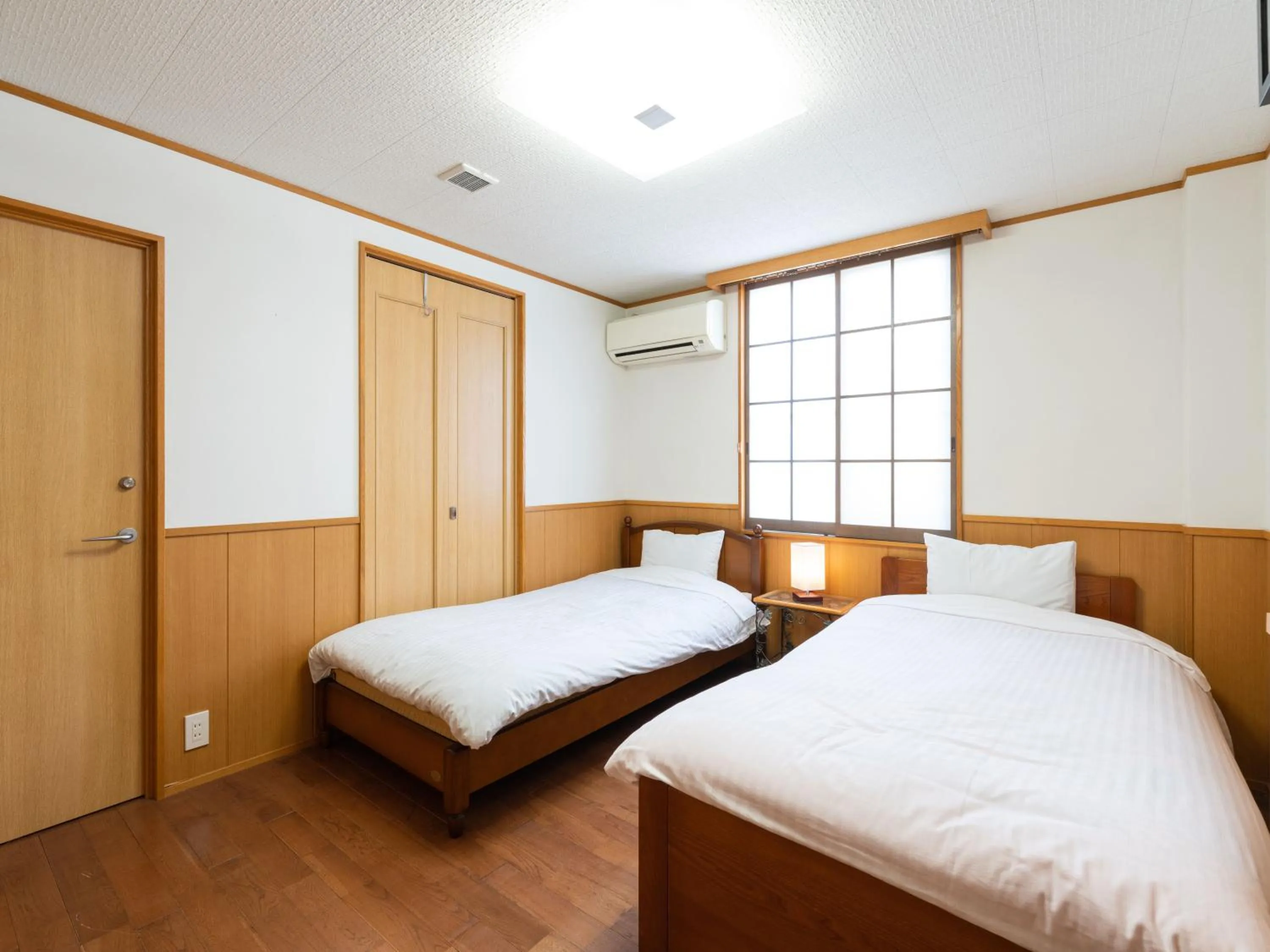 Bed in Travel Inn Kofu