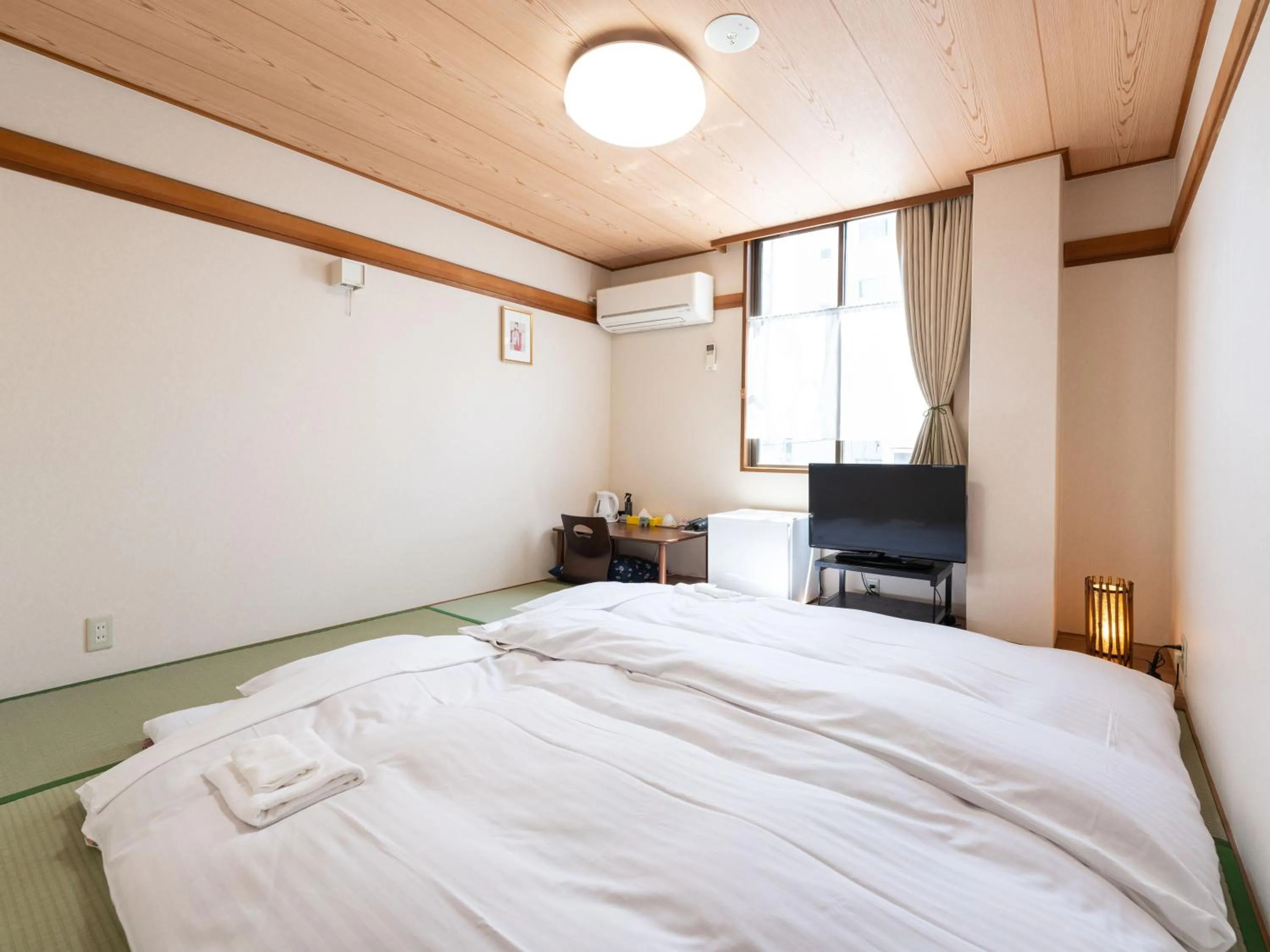 Photo of the whole room, Bed in Travel Inn Kofu