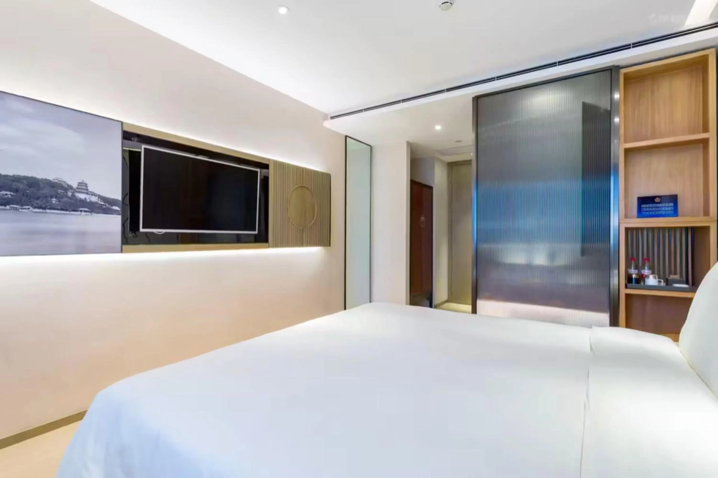 Photo of the whole room, Bed in Atour Hotel Beijing Fuxingmen