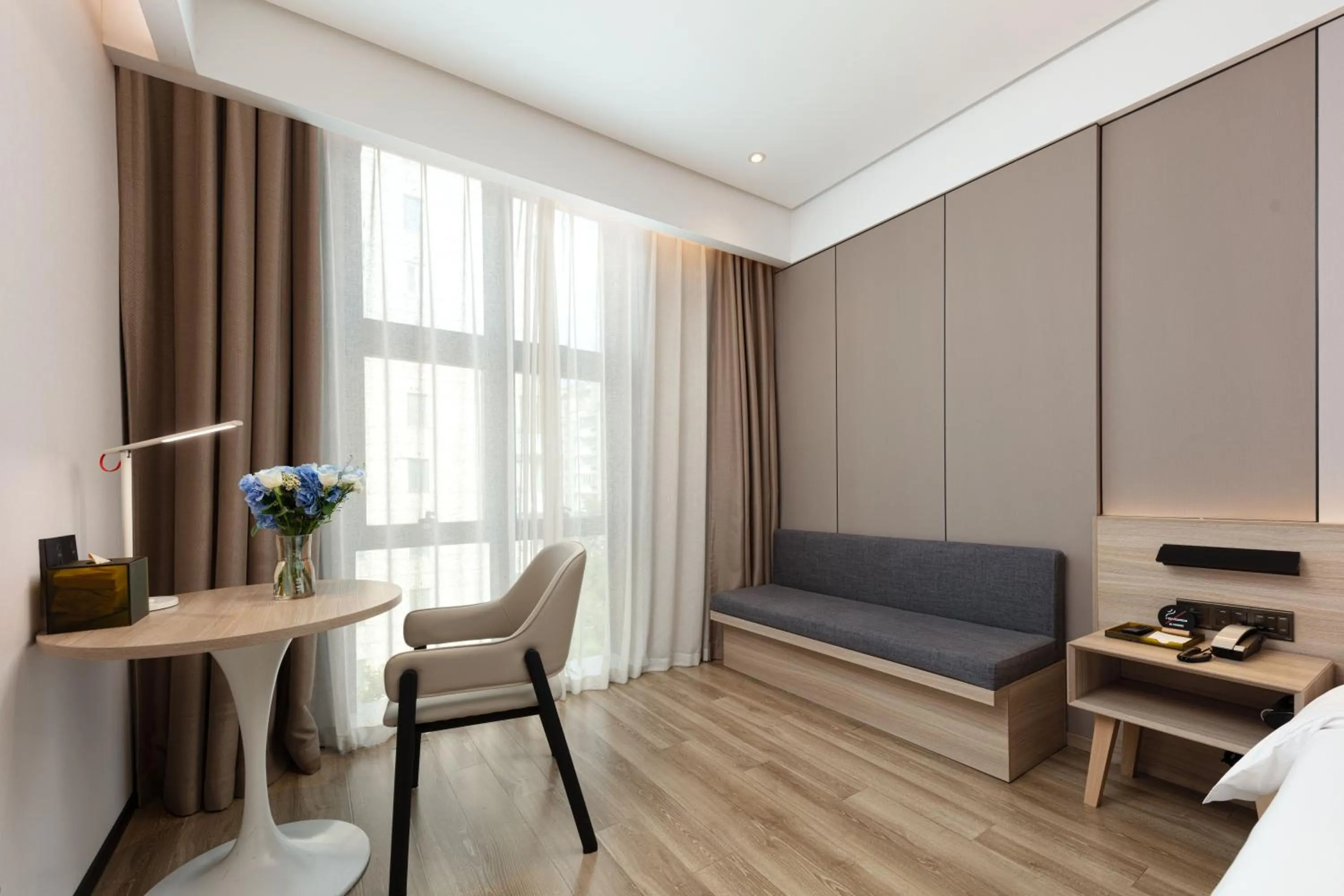 Living room, Bed in Atour Hotel Shanghai Hongqiao Korea Street