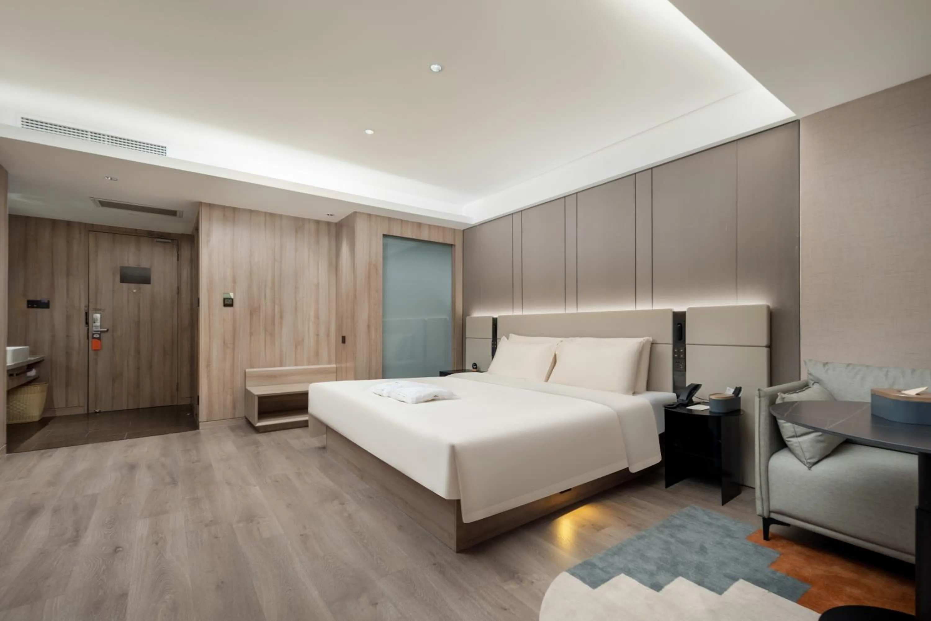 Bed in Atour Hotel Qingdao Olympic Sailing Center May Fourth Square