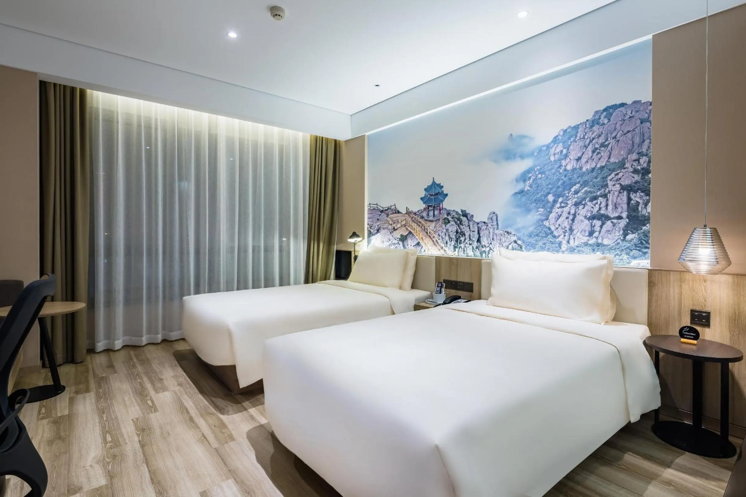 Bed in Atour Hotel Qingdao Fuzhou Road Sakura Town