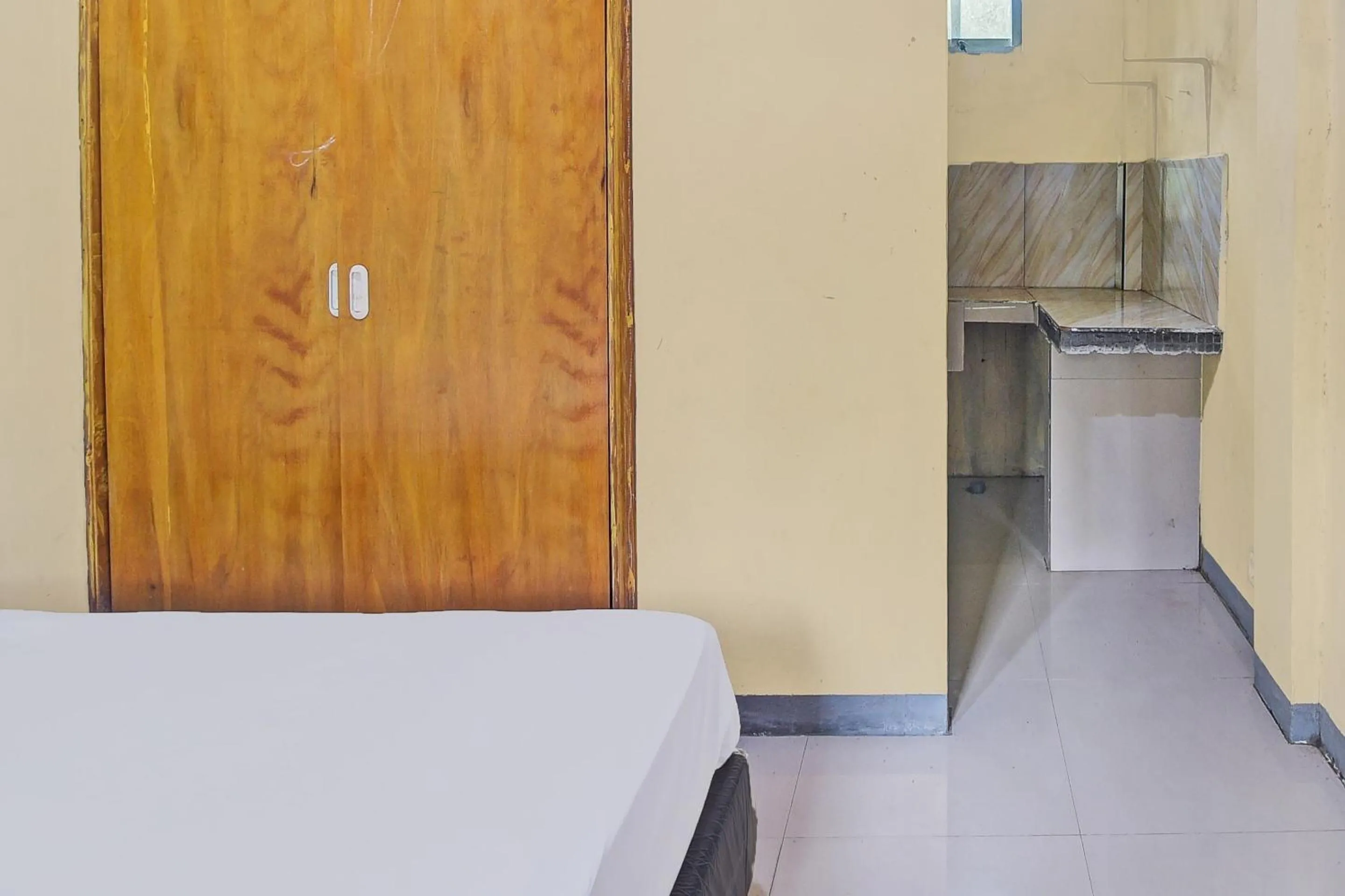 Bedroom in Hotel O Susupuan KostNearTaman Deki Lestari