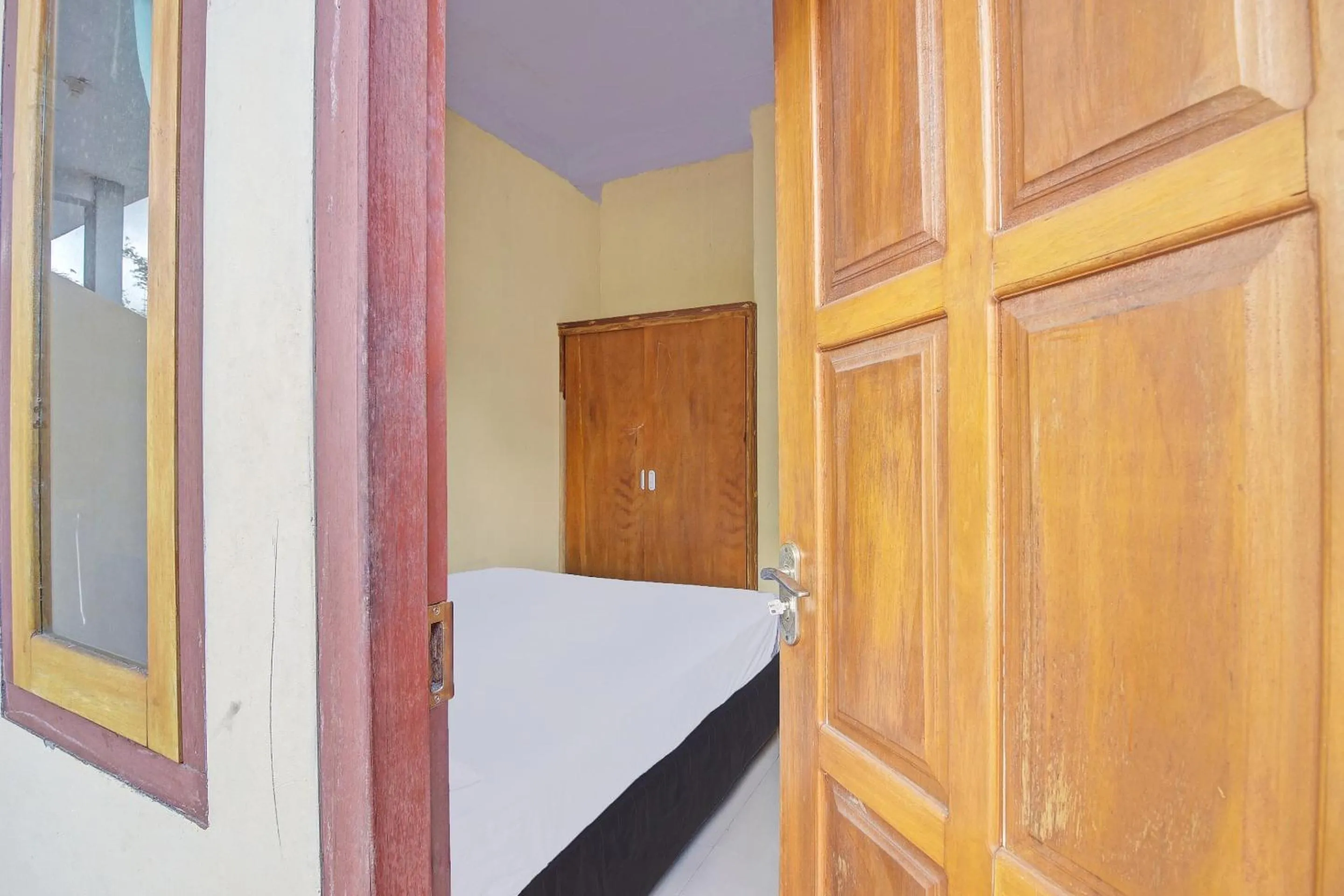 Bedroom, Bed in Hotel O Susupuan KostNearTaman Deki Lestari