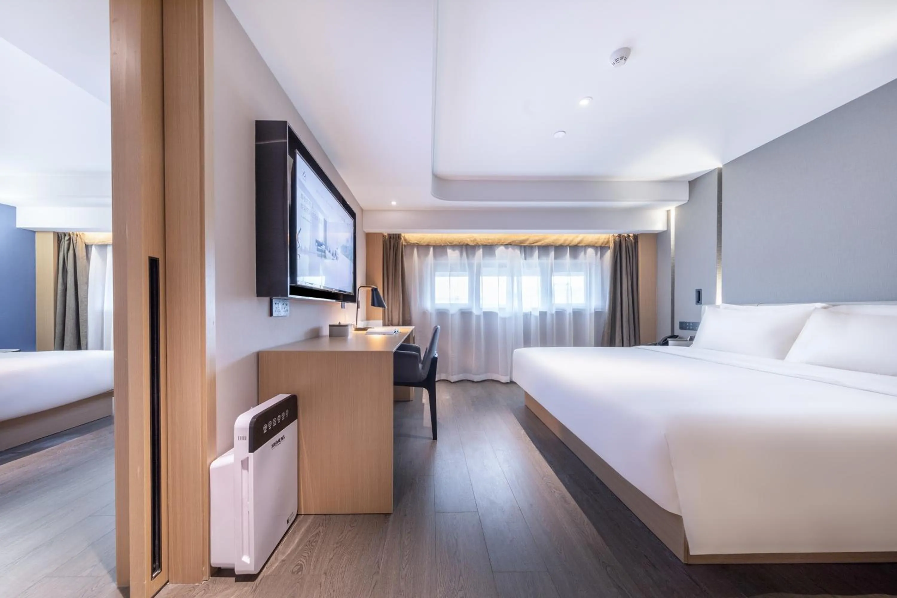 Bed in Atour Hotel Suzhou Guanqian Street Leqiao Station