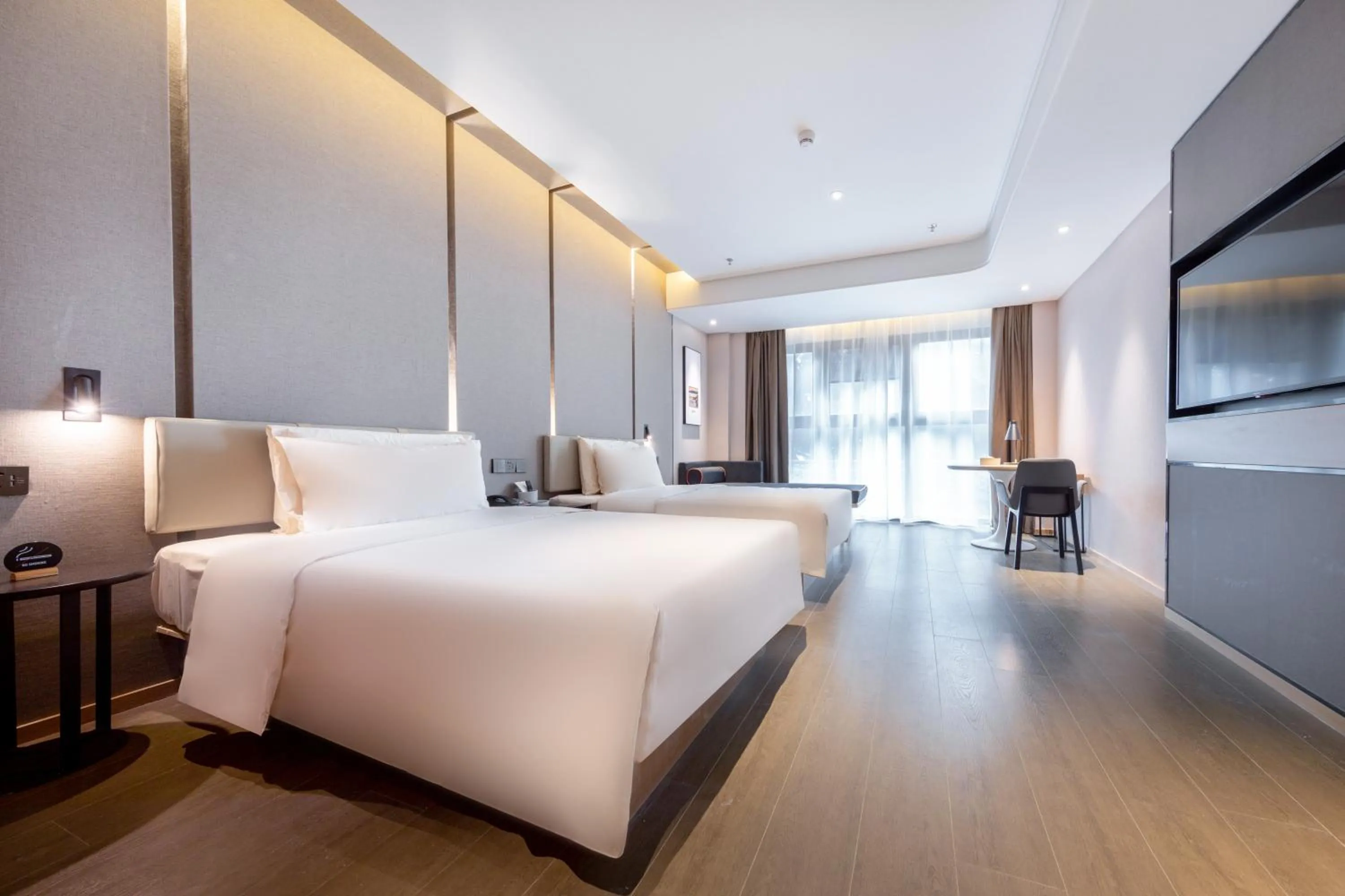 Bed in Atour Hotel Shenzhen Shajing International Convention and Exhibition Center