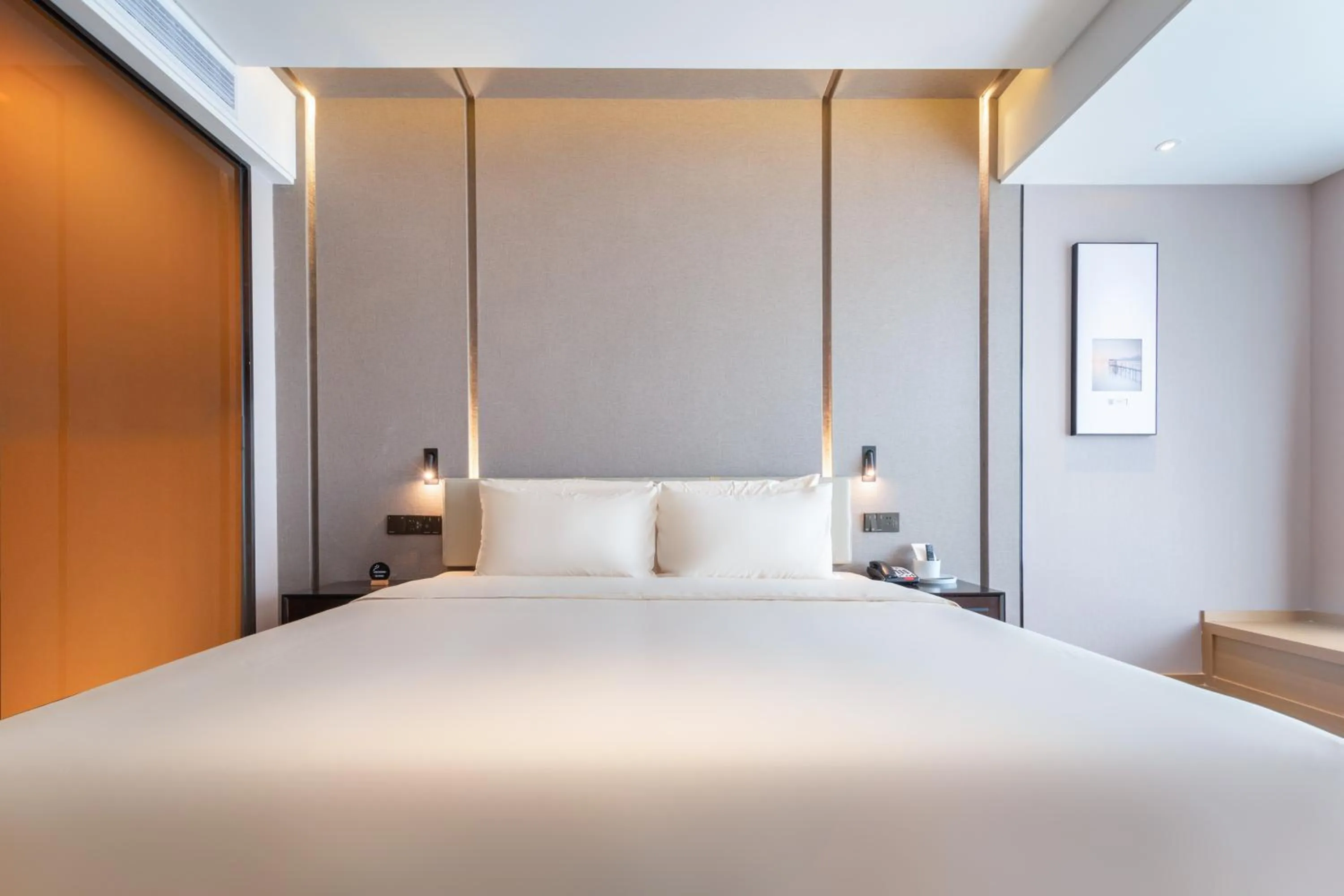 Bed in Atour Hotel Shenzhen Shajing International Convention and Exhibition Center